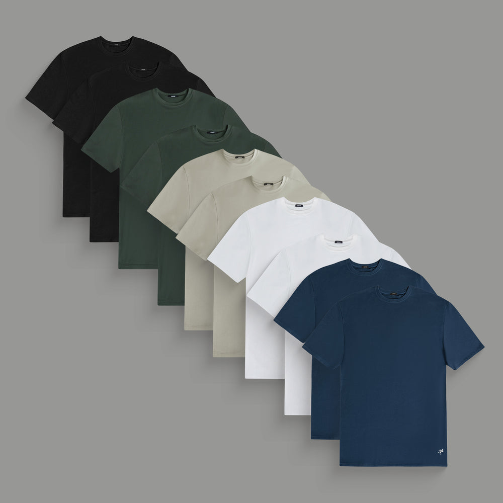 A variety of colored t-shirts arranged in a fan shape against a plain background.