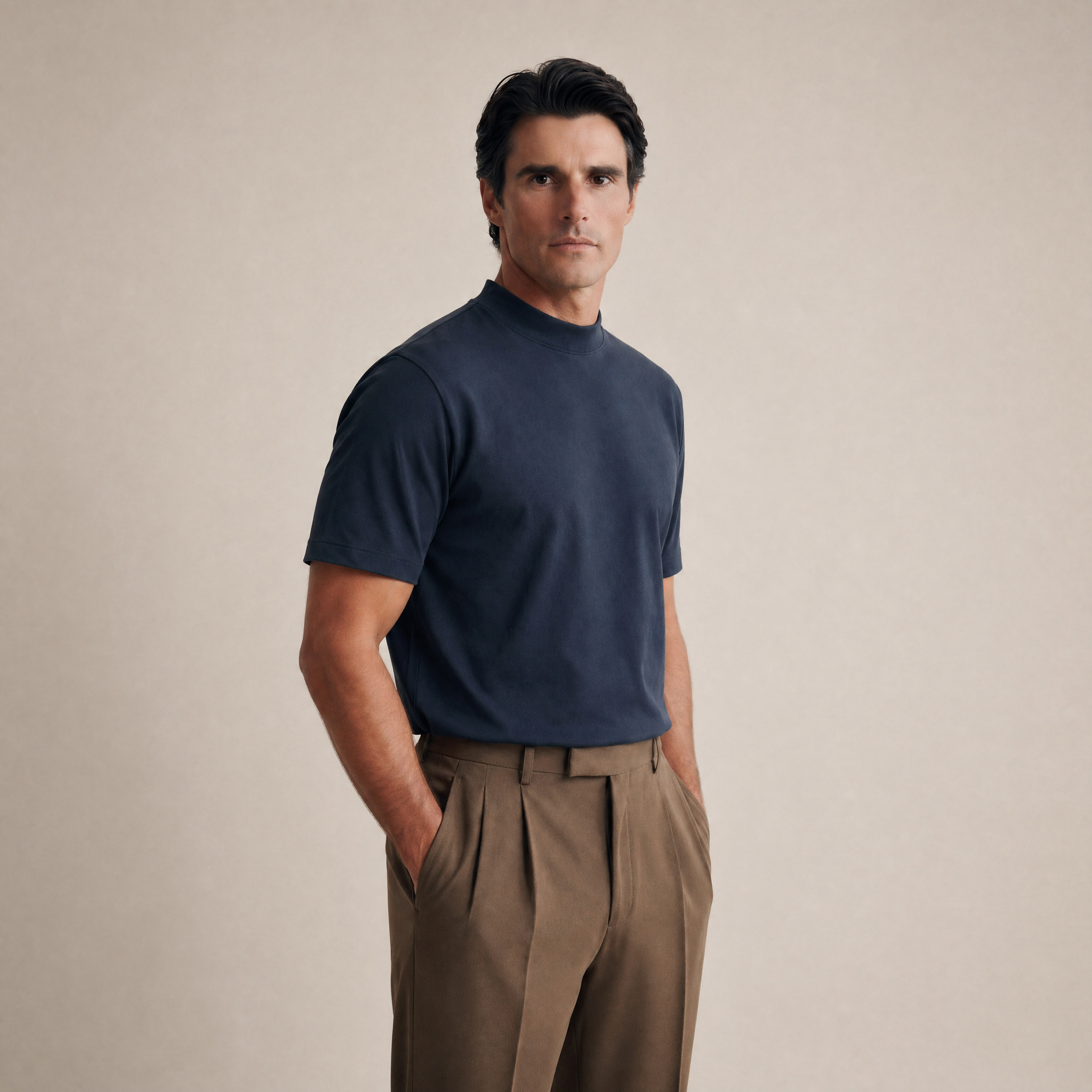 Man wearing a Deep Sea short-sleeve shirt against a beige background model Kive in Deep Sea