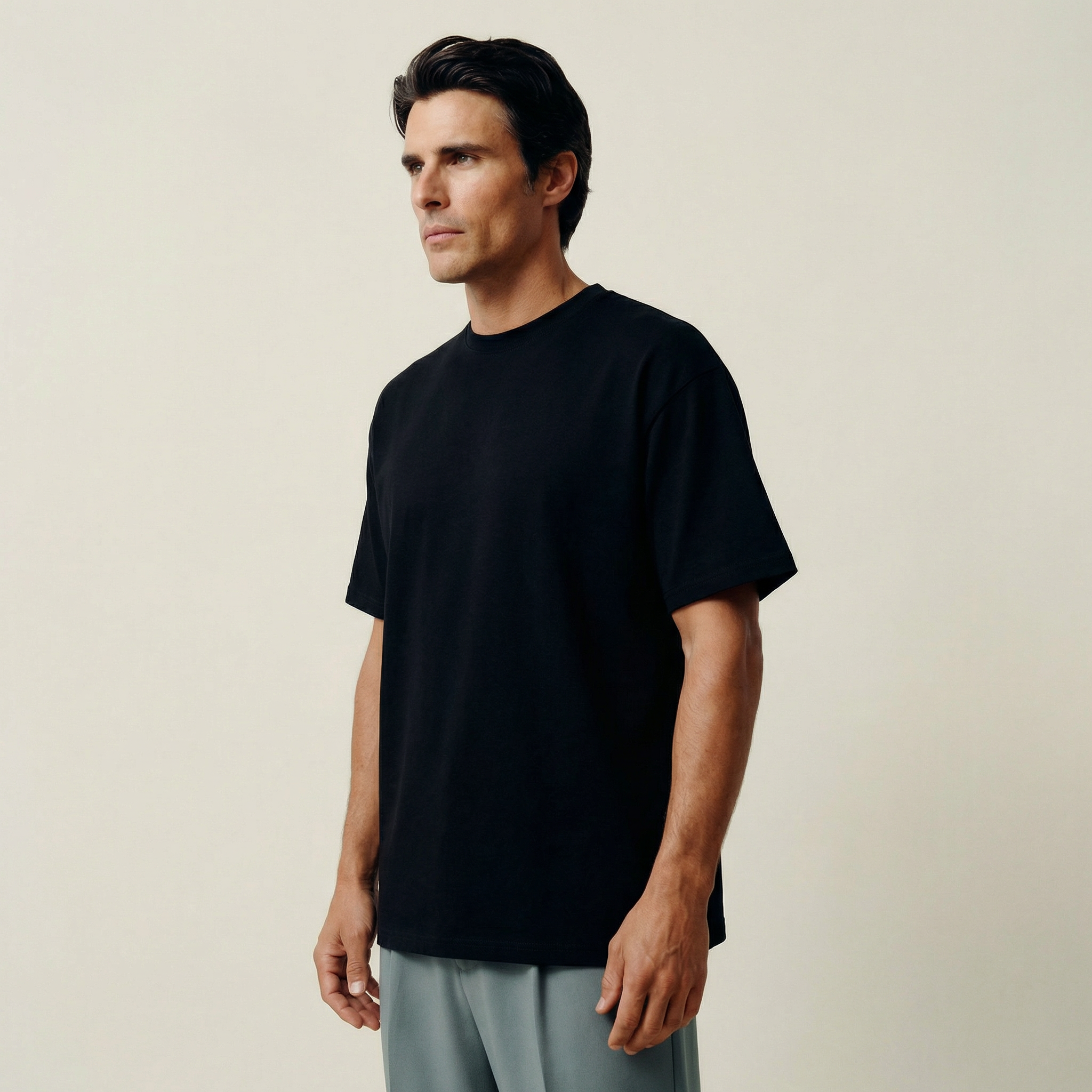 Cumulus oversized t-shirt on a beige background model Kive in All-Black