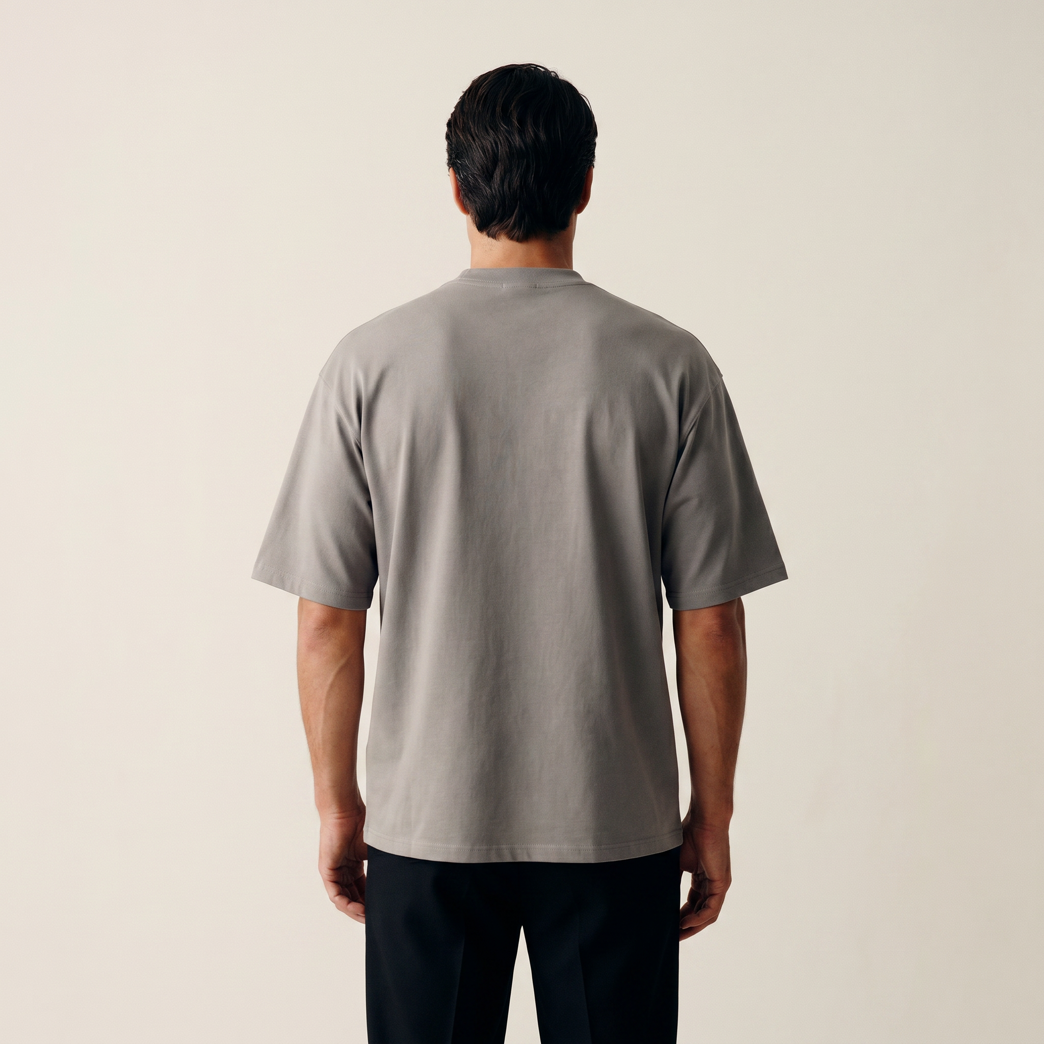 Cumulus oversized t-shirt on a beige background model Kive in Canyon