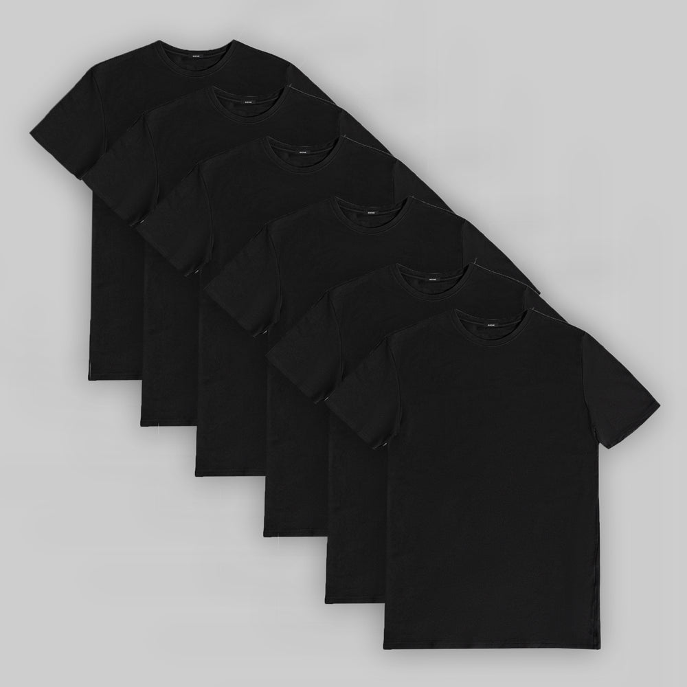 Five black t-shirts arranged in a cascading pattern on a gray background.