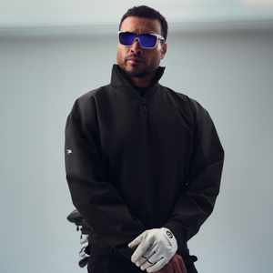 bespoke custom-fit golf nylon rain shell water resistant wind breaker quarter zip model chad in black