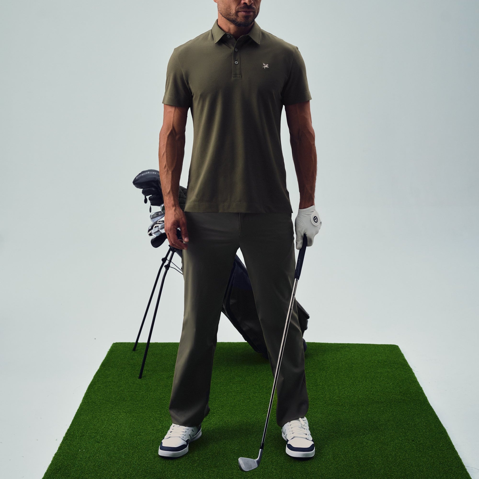 chad wearing custom-fit golf attire model Chad in olive