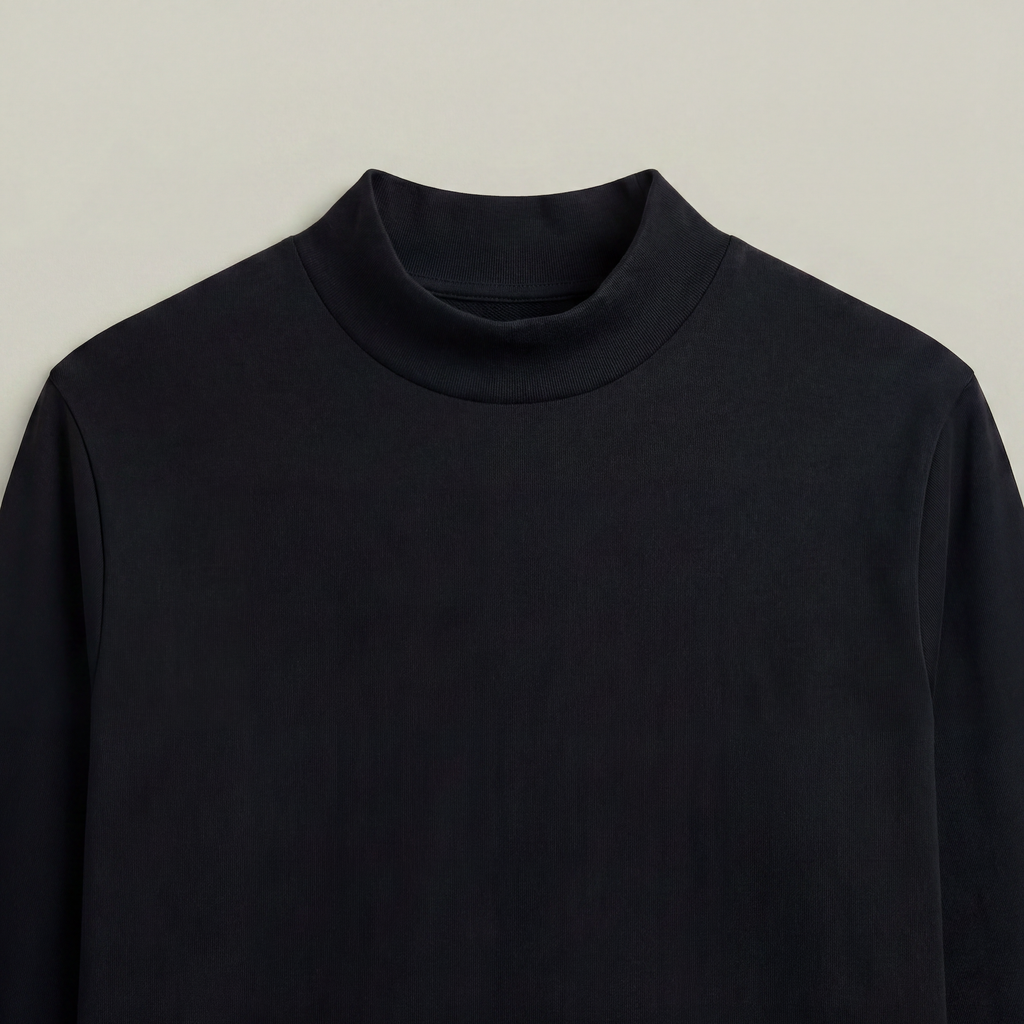 Black mockneck sweater on a beige background model kive in black