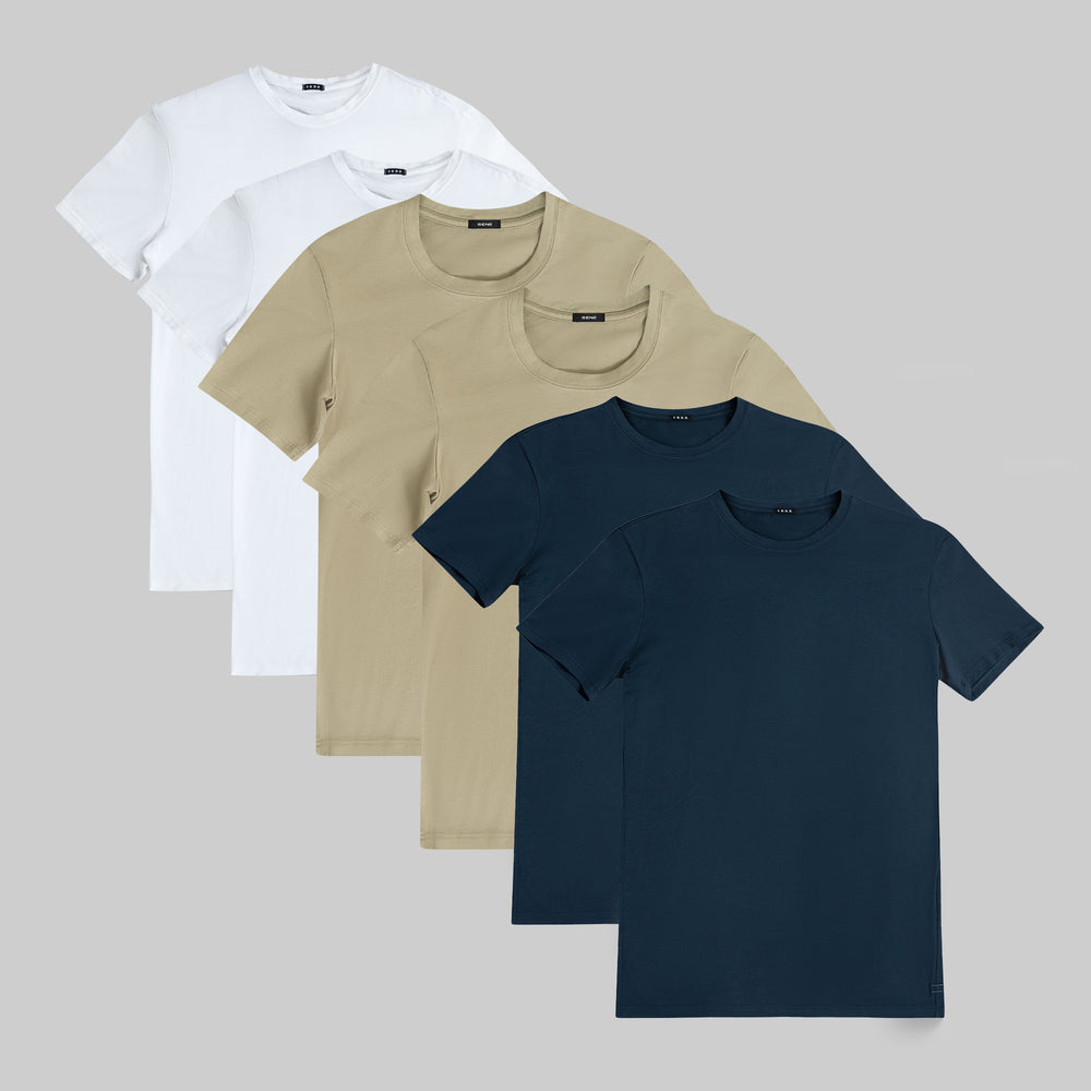 Five t-shirts in white, beige, and dark blue on a gray background.