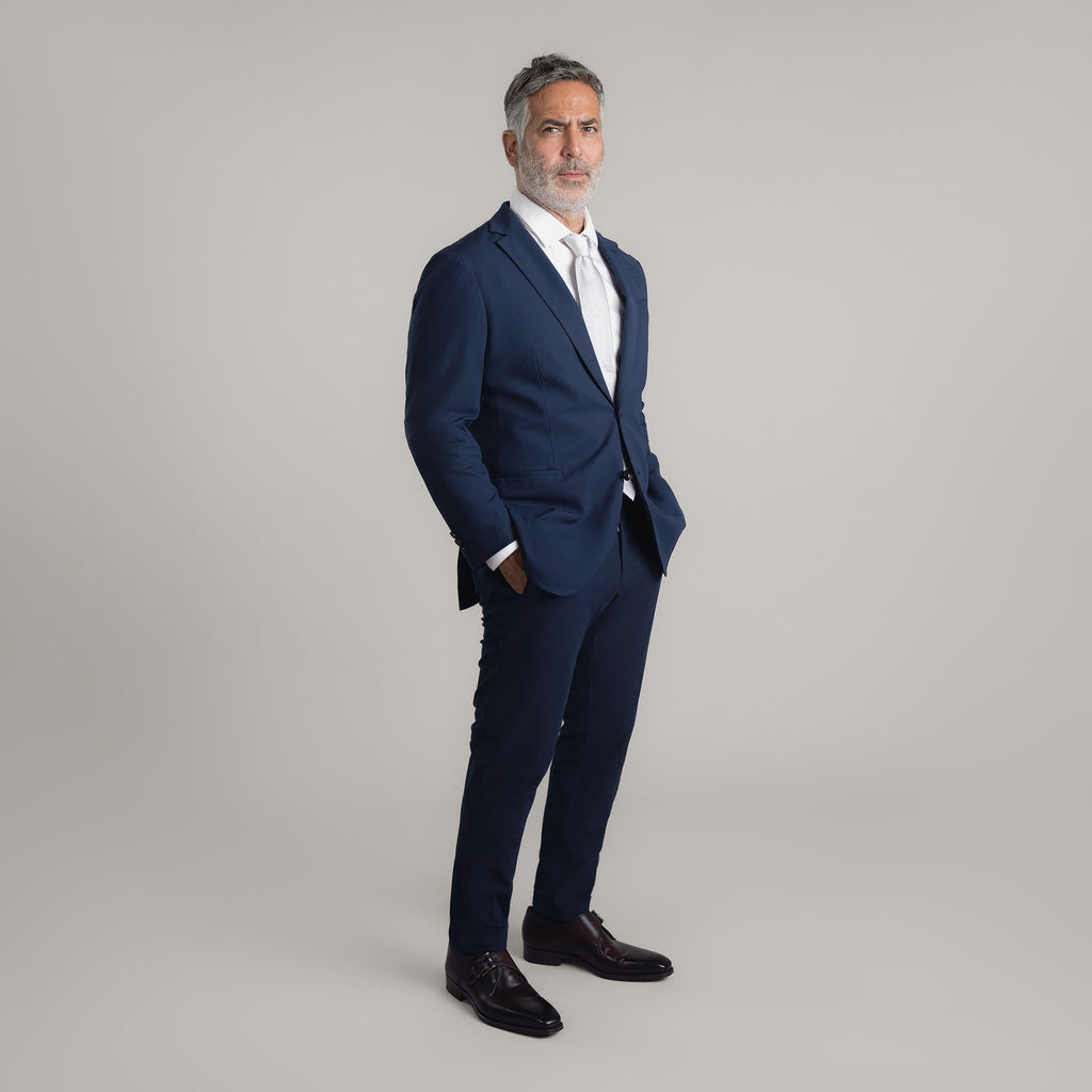 Tags:(5'11"|176 lbs) Bespoke custom athleisure technical men's suit los angeles model Guillermo in Navy