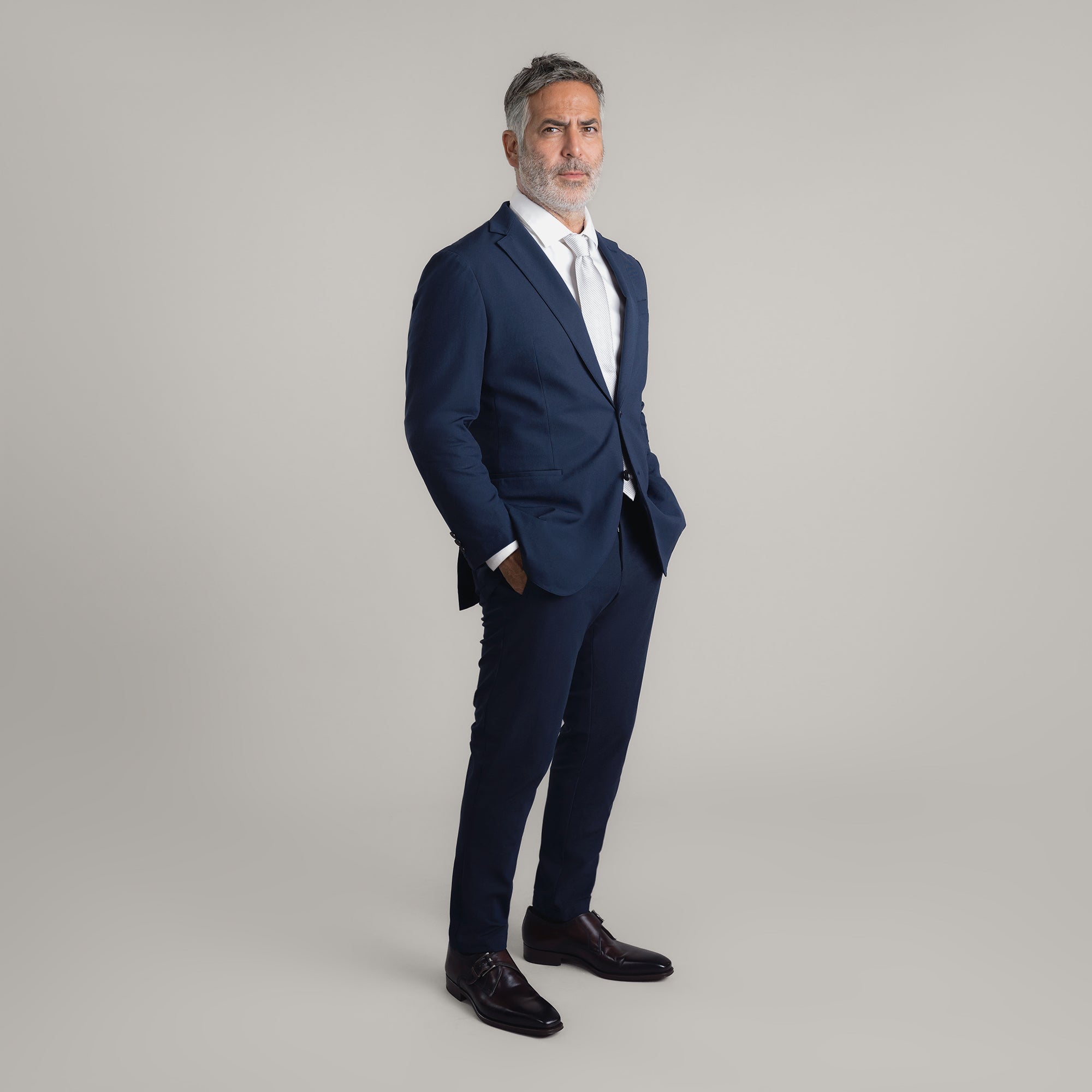 Tags:(5'11"|176 lbs) Bespoke custom athleisure technical men's suit los angeles model Guillermo in Navy