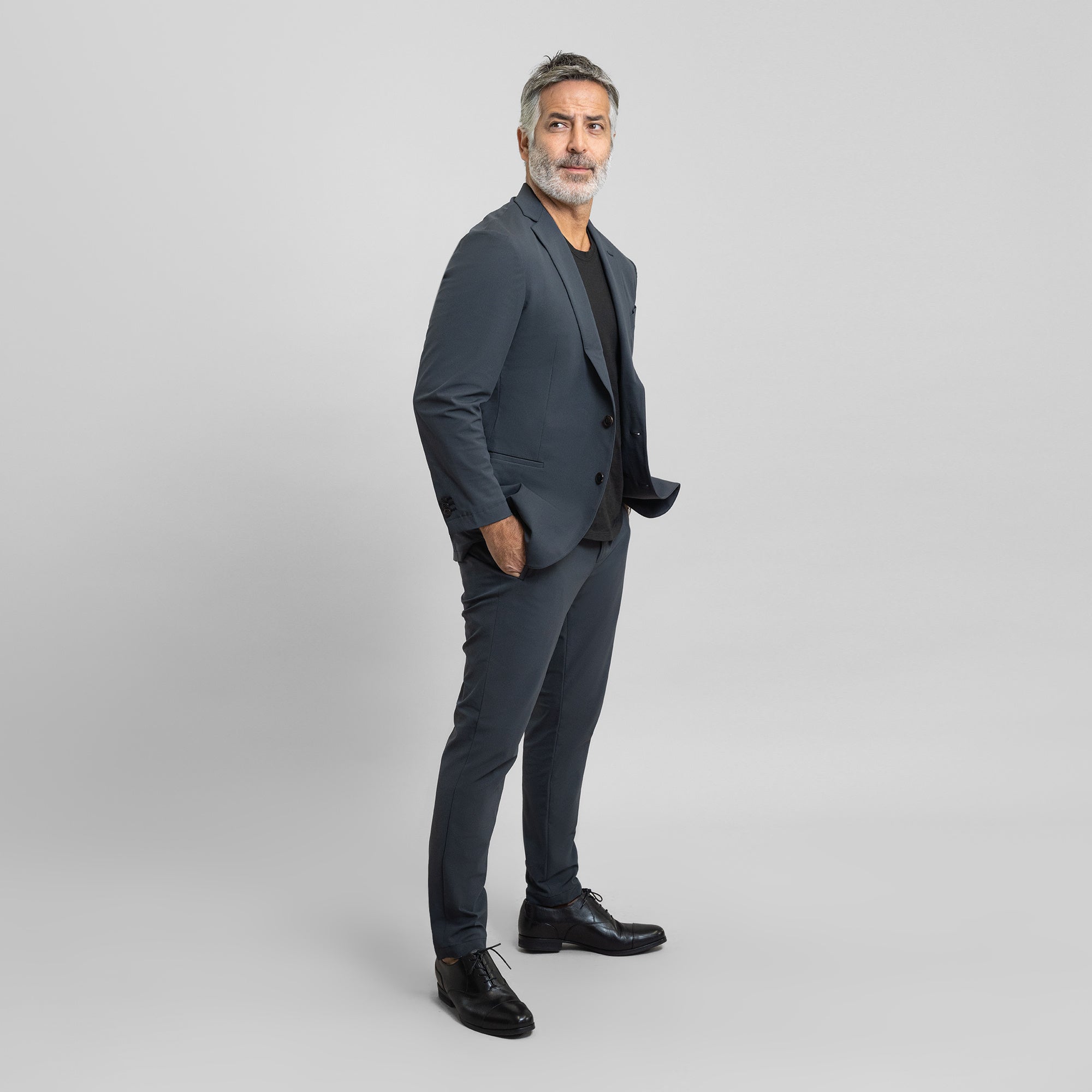 Tags:(5'11"|176 lbs) Bespoke custom athleisure technical men's suit los angeles model Guillermo in Charcoal