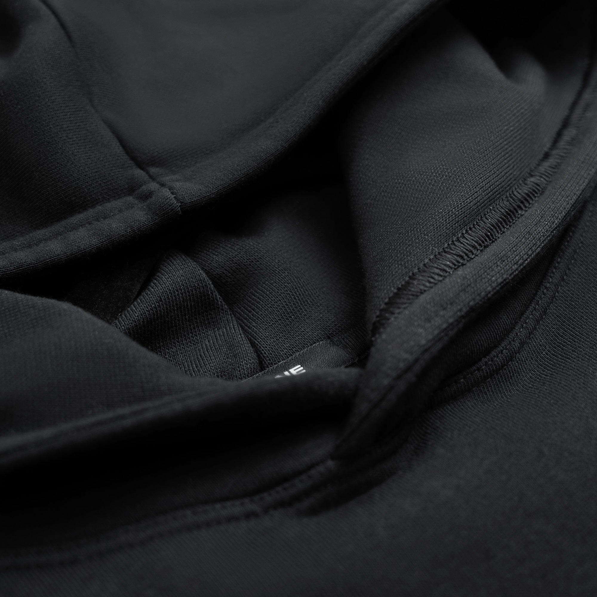 Close-up of black fabric texture model Kive in Black