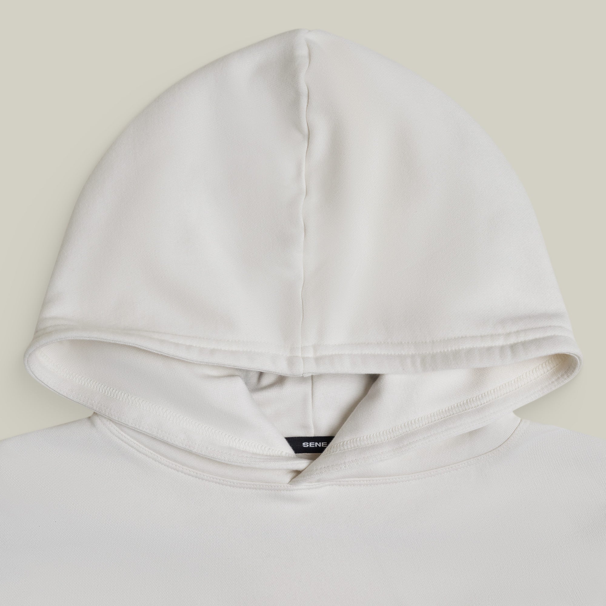 Terry Fleece Court Hoodie model Matteo in Bone