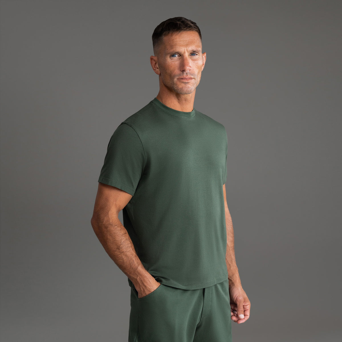 Tags:(6'0" - 180 lbs|Medium|Tailored|Standard) custom t-shirt tee model Tyler in Moss