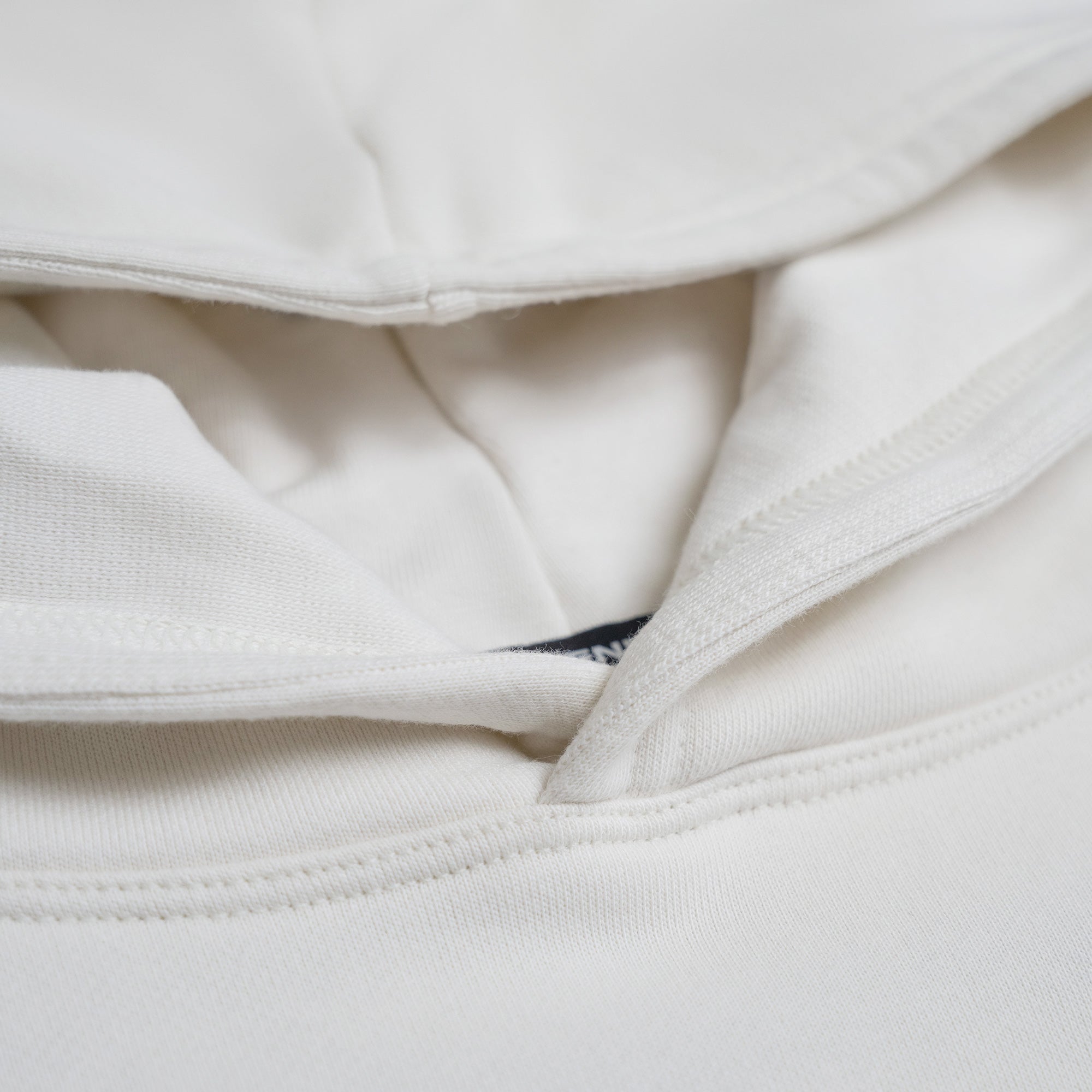Terry Fleece Court Hoodie model Matteo in Bone