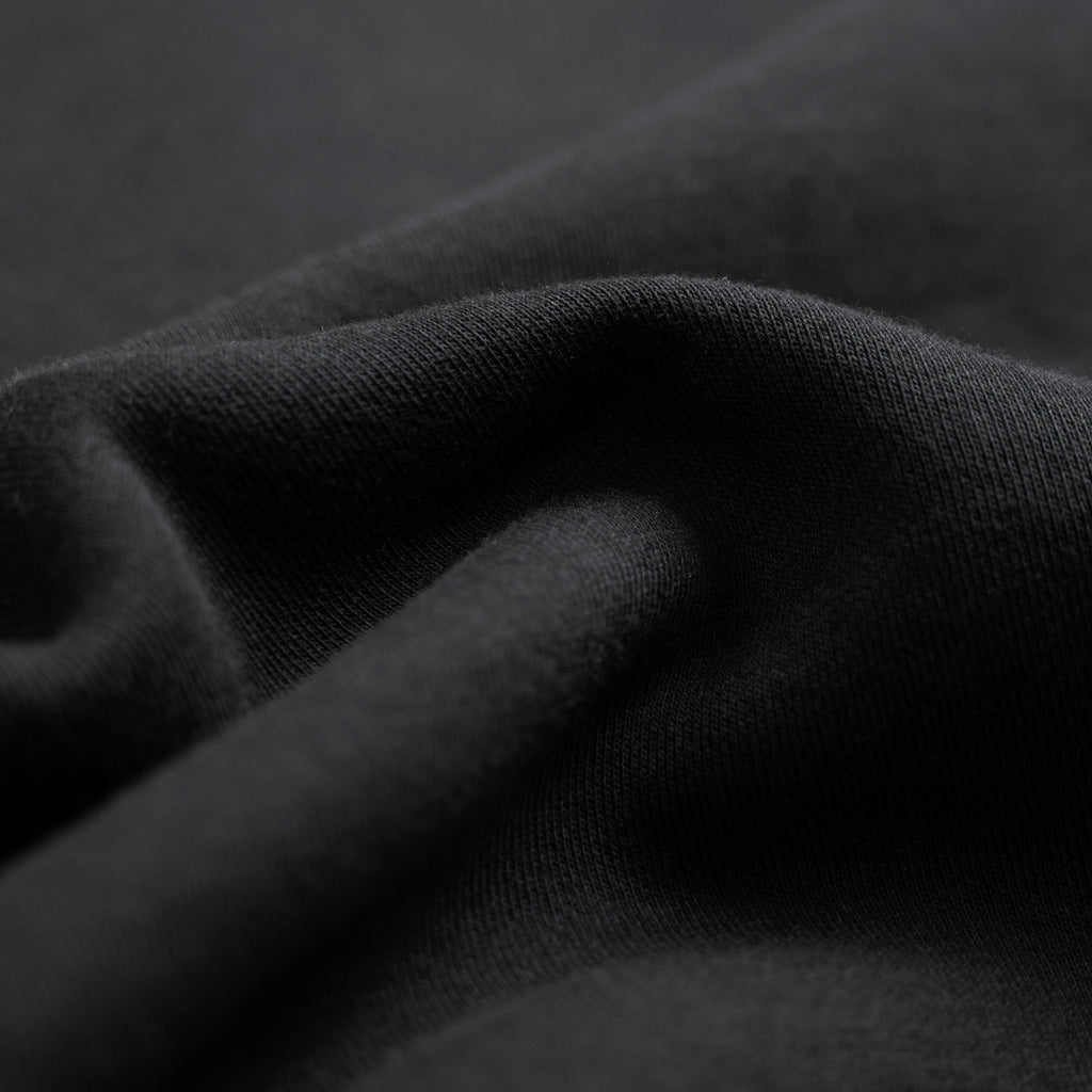 Close-up of dark fabric texture model Kive in Black