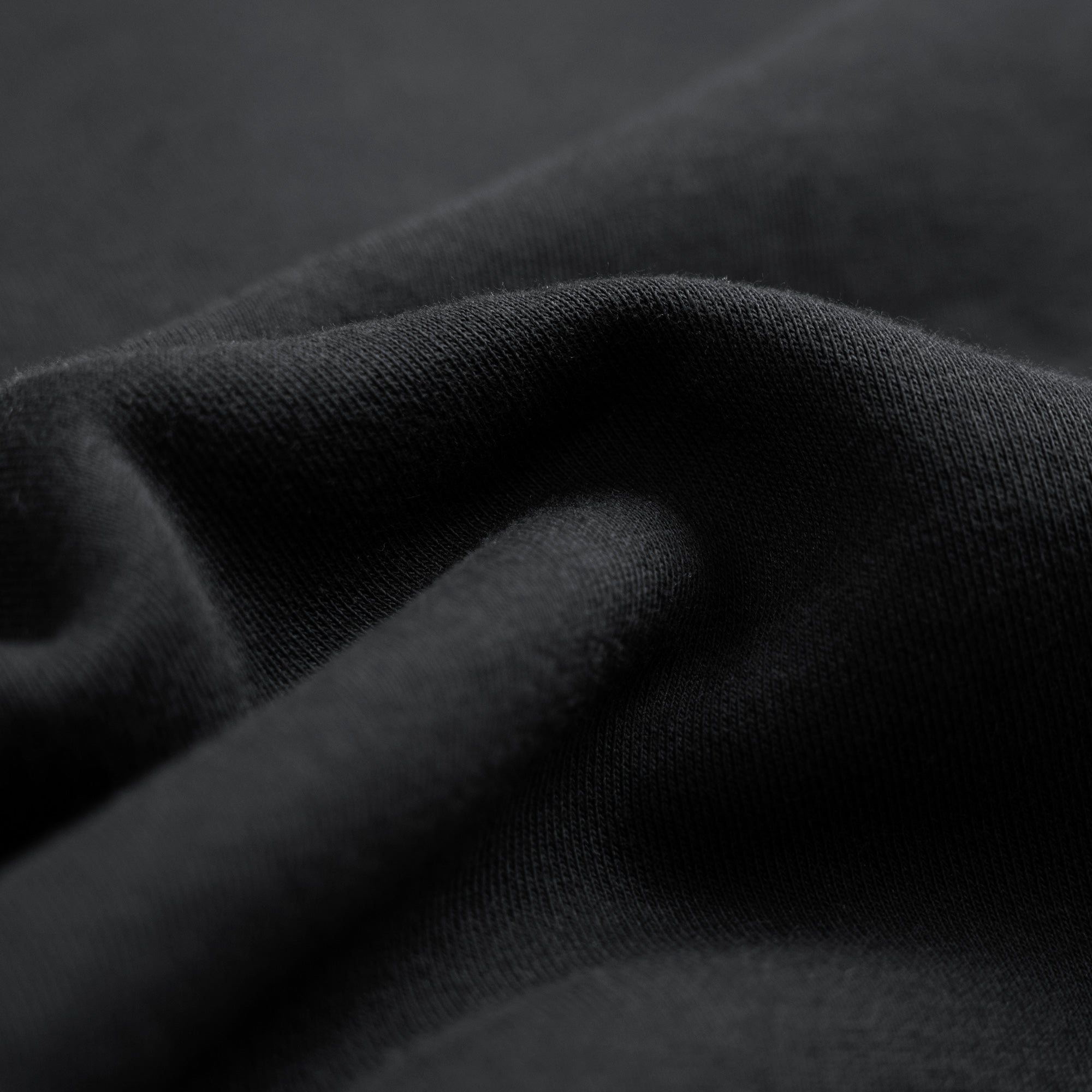 Close-up of dark fabric texture model Kive in Black