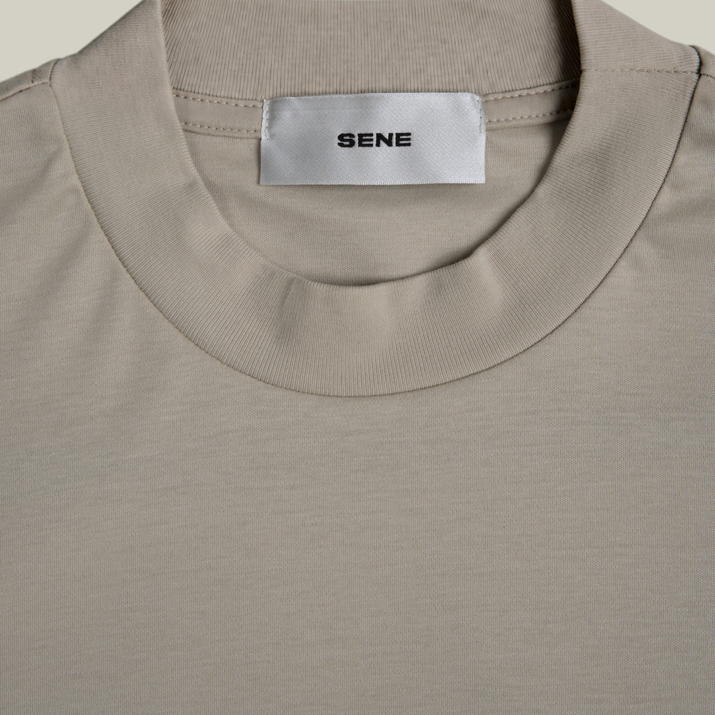Pima Reserve Mock Neck T-Shirt model Guillermo in Beige