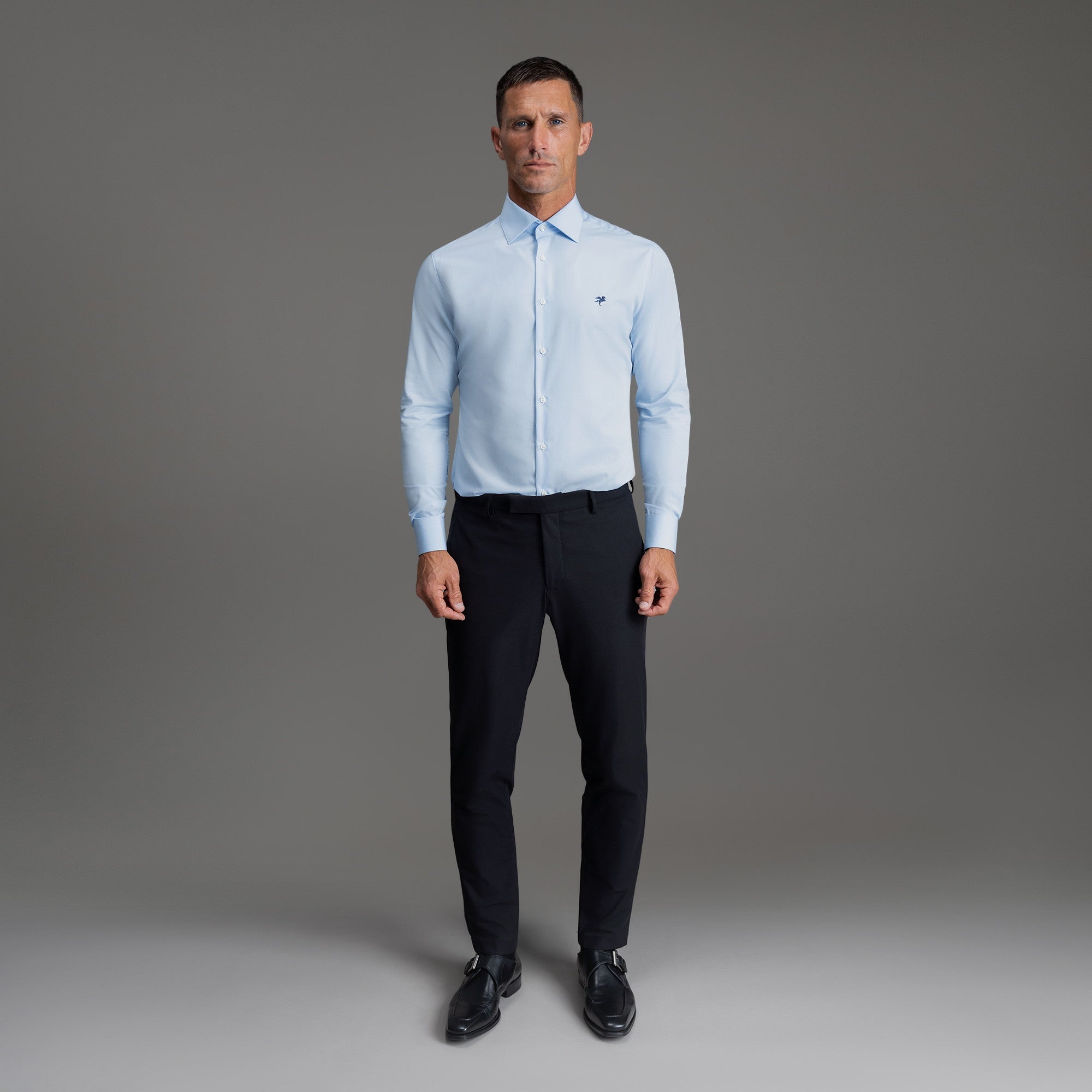 Custom Bespoke Tailored Spread Shirt model Tyler in Light Blue Emblem