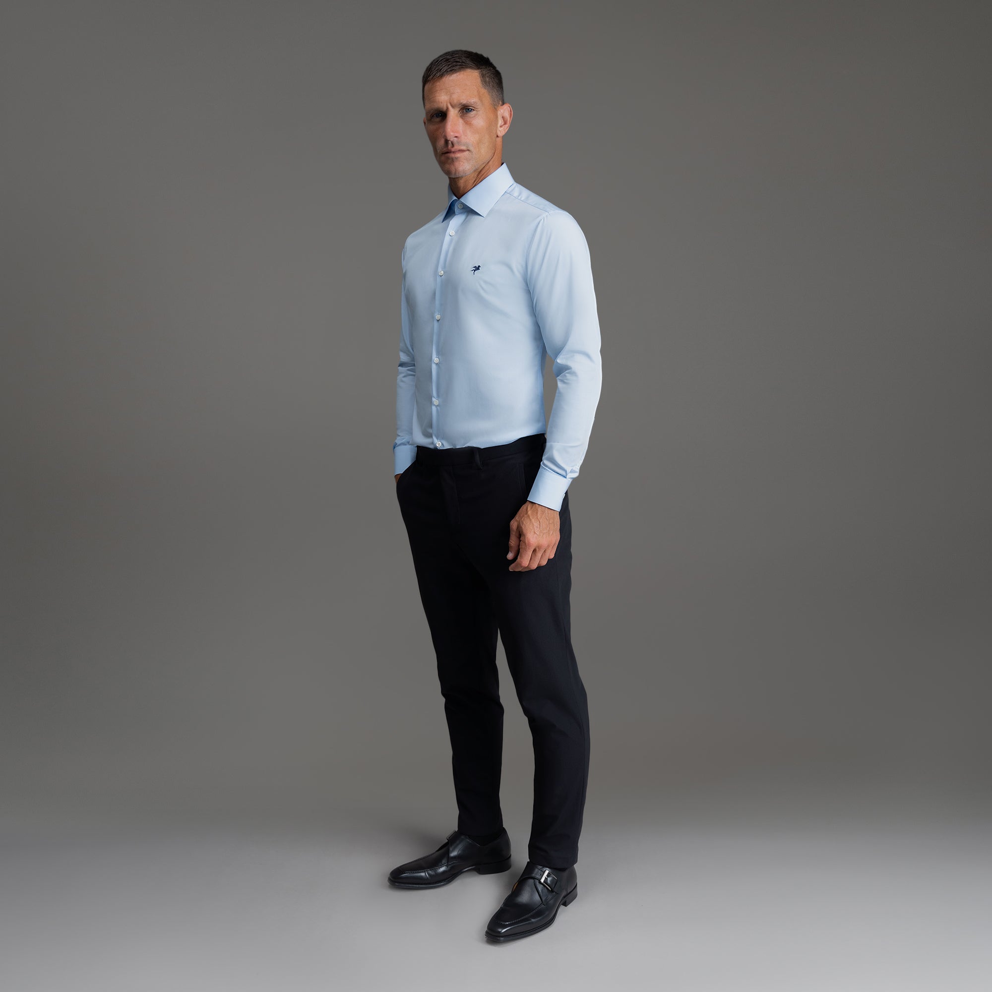 Custom Bespoke Tailored Spread Shirt model Tyler in Light Blue Emblem