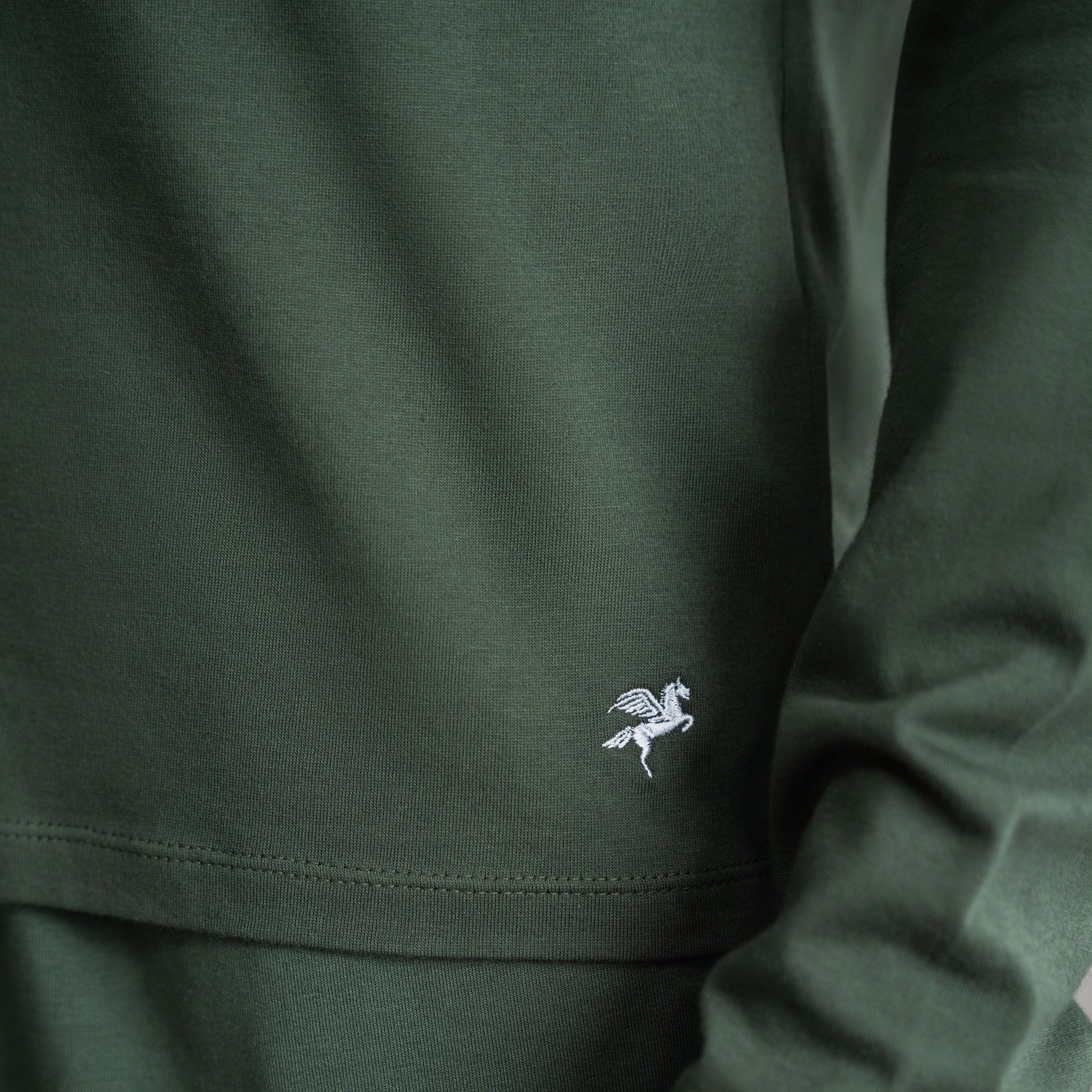 Tags:(6'0" - 180 lbs|Medium) Custom longsleeve t-shirt on model Tyler in Moss