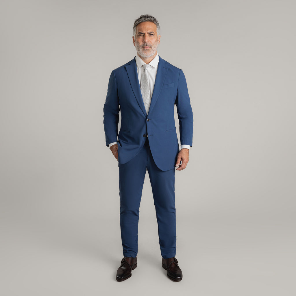 Tags:(5'11"|176 lbs) Bespoke custom athleisure technical athletic stretch suit los angeles model Guillermo in Italian Blue