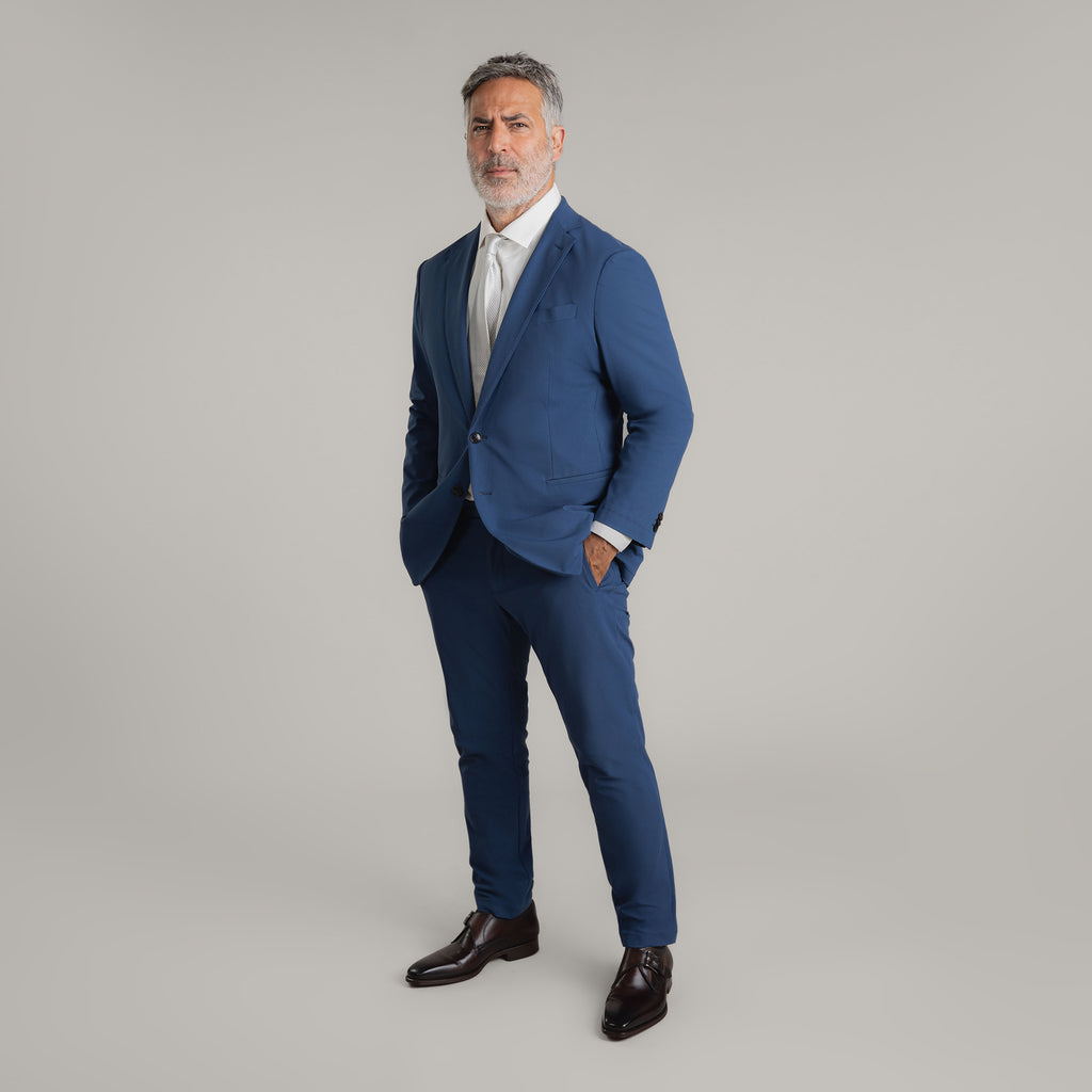 Tags:(5'11"|176 lbs) Bespoke custom athleisure technical athletic stretch suit los angeles model Guillermo in Italian Blue