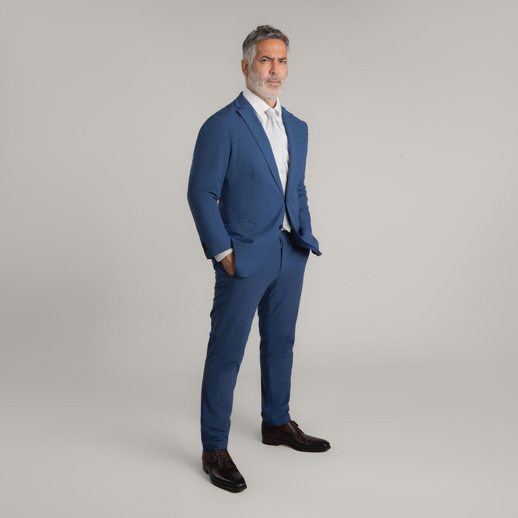 Tags:(5'11"|176 lbs) Bespoke custom athleisure technical athletic stretch suit los angeles model Guillermo in Italian Blue