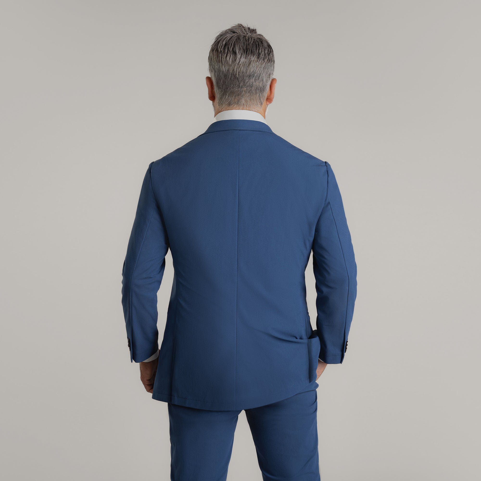 Tags:(5'11"|176 lbs) Bespoke custom athleisure technical athletic stretch suit los angeles model Guillermo in Italian Blue