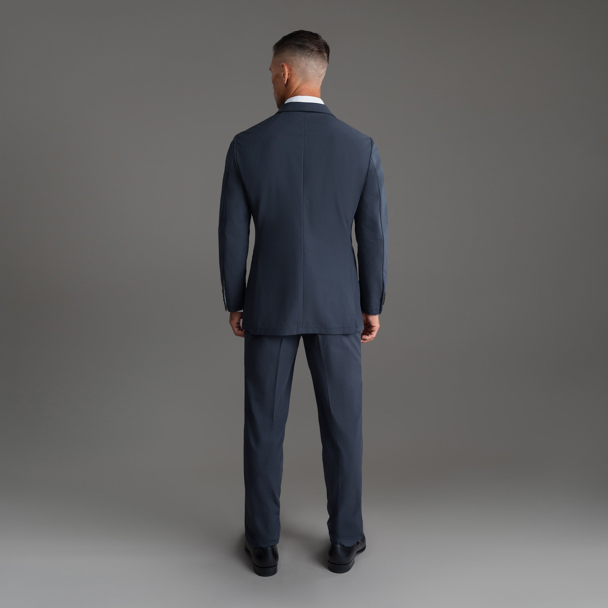 Custom Peak Lapel Tuxedo model Tyler in Charcoal
