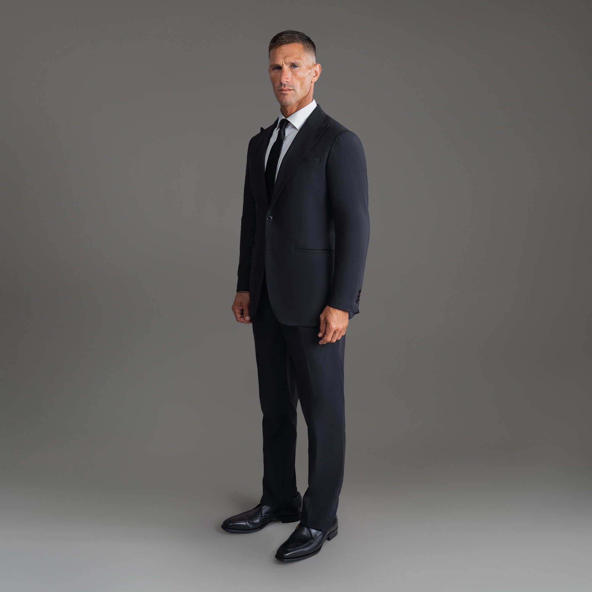 Custom Peak Lapel Tuxedo model Tyler in Black