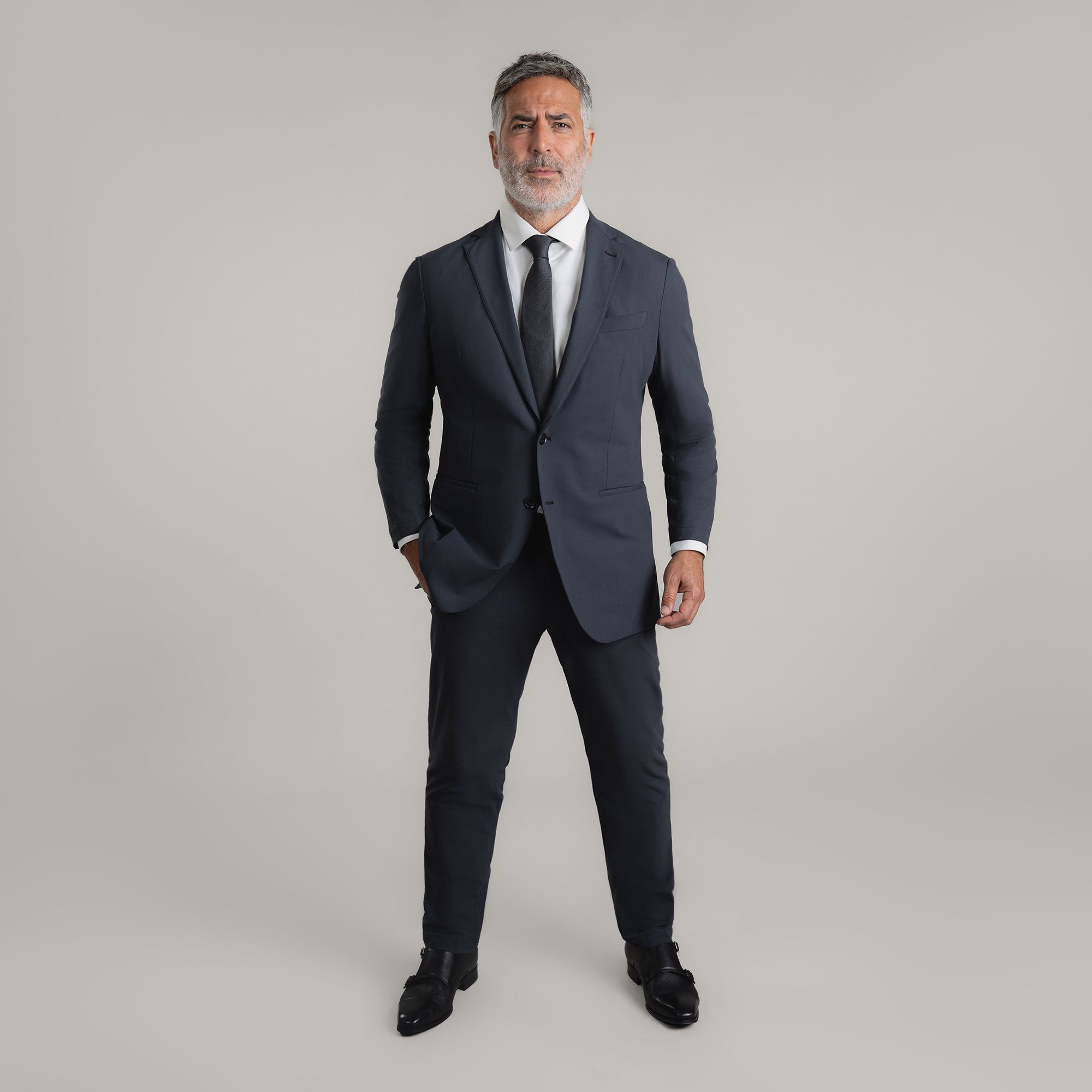 Tags:(5'11"|176 lbs) Bespoke custom athleisure technical men's suit los angeles model Guillermo in Charcoal