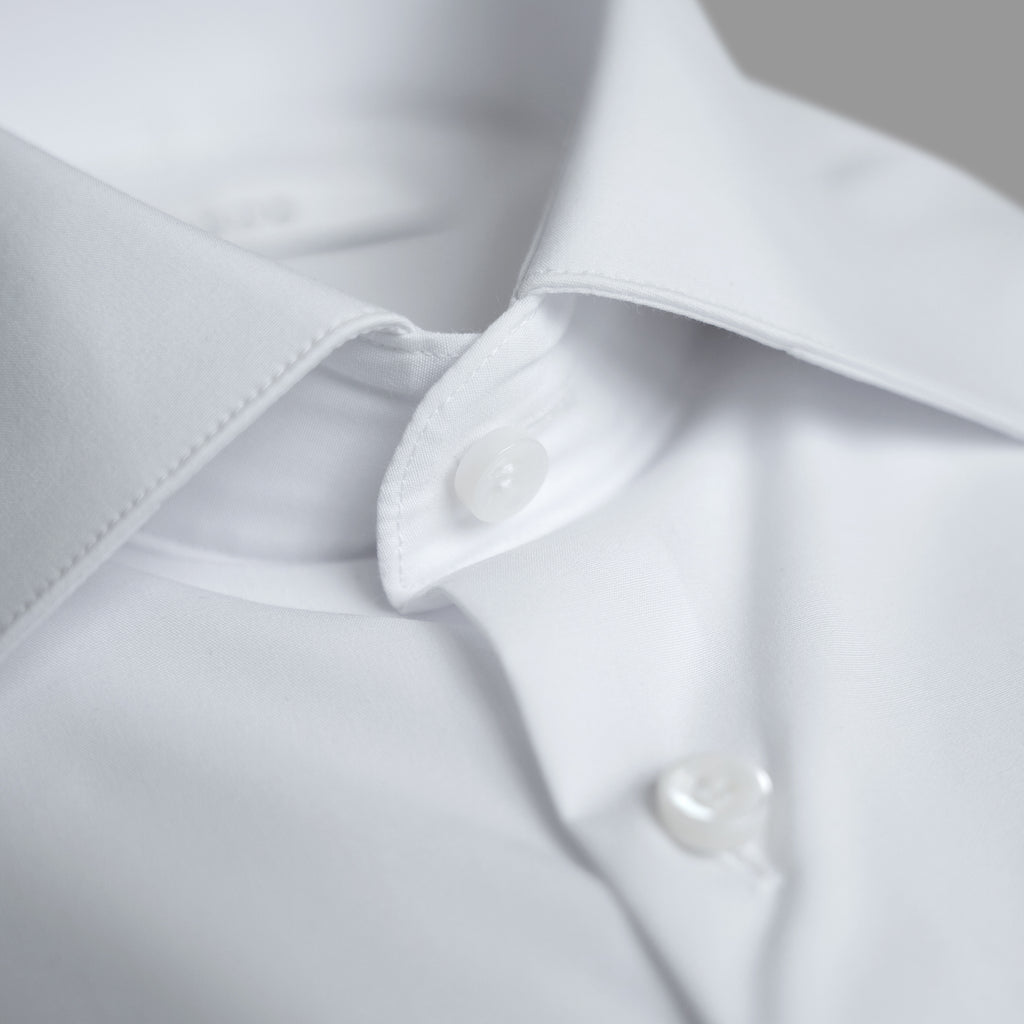 Custom Bespoke Tailored Spread Shirt model Tyler in White Navy Emblem