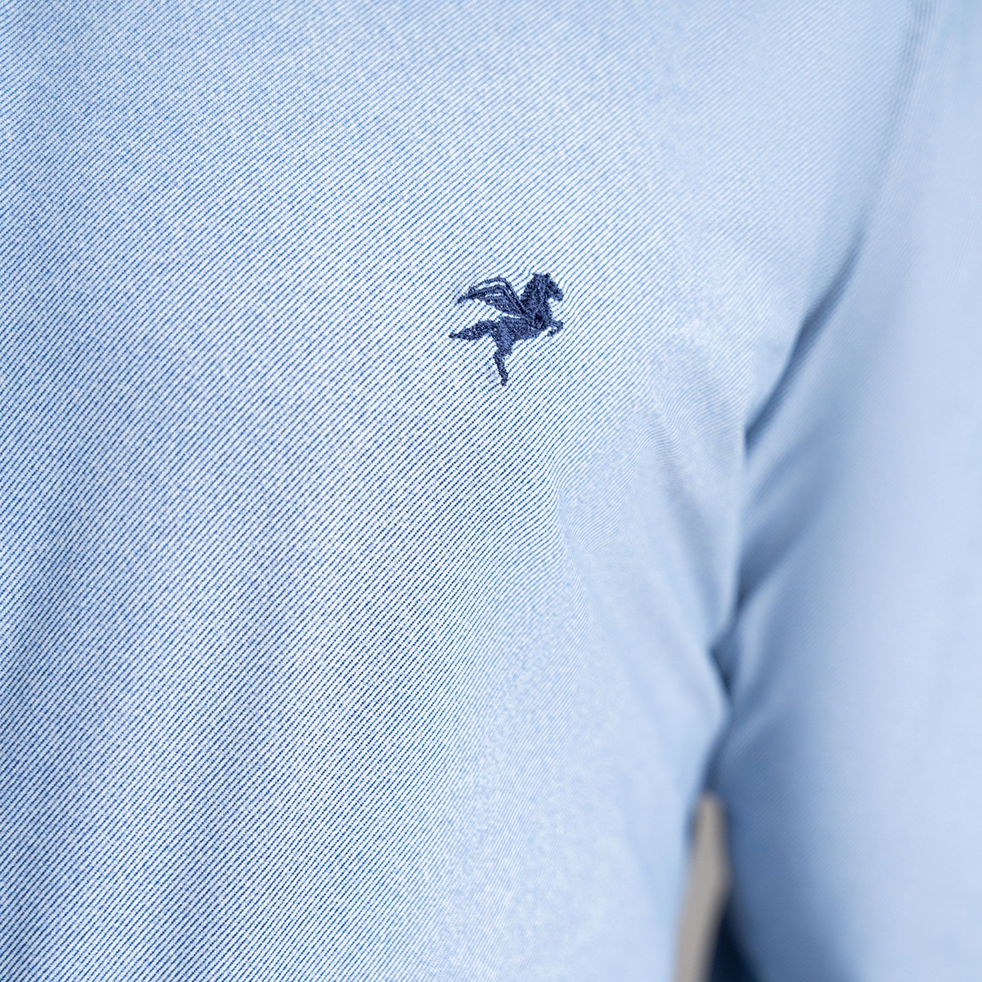 Custom Bespoke Tailored Spread Shirt model Tyler in Light Blue Emblem