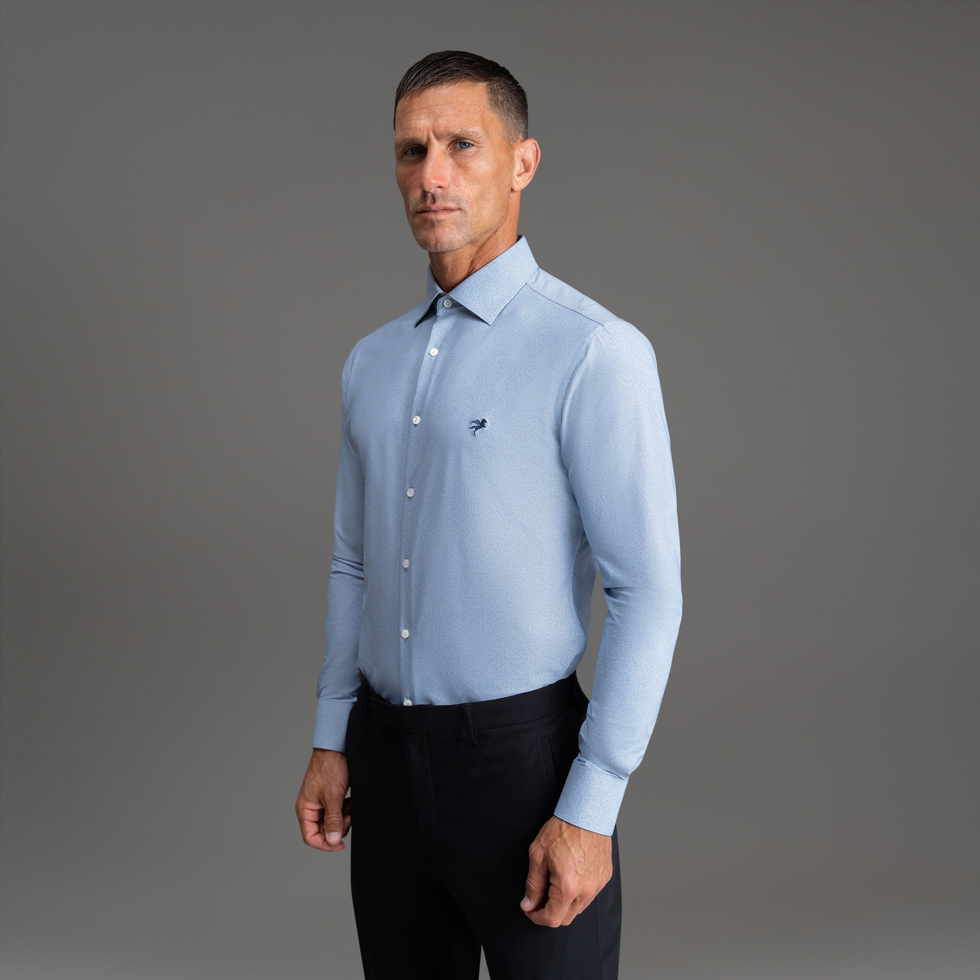 Custom Bespoke Tailored Spread Shirt model Tyler in Light Blue Emblem