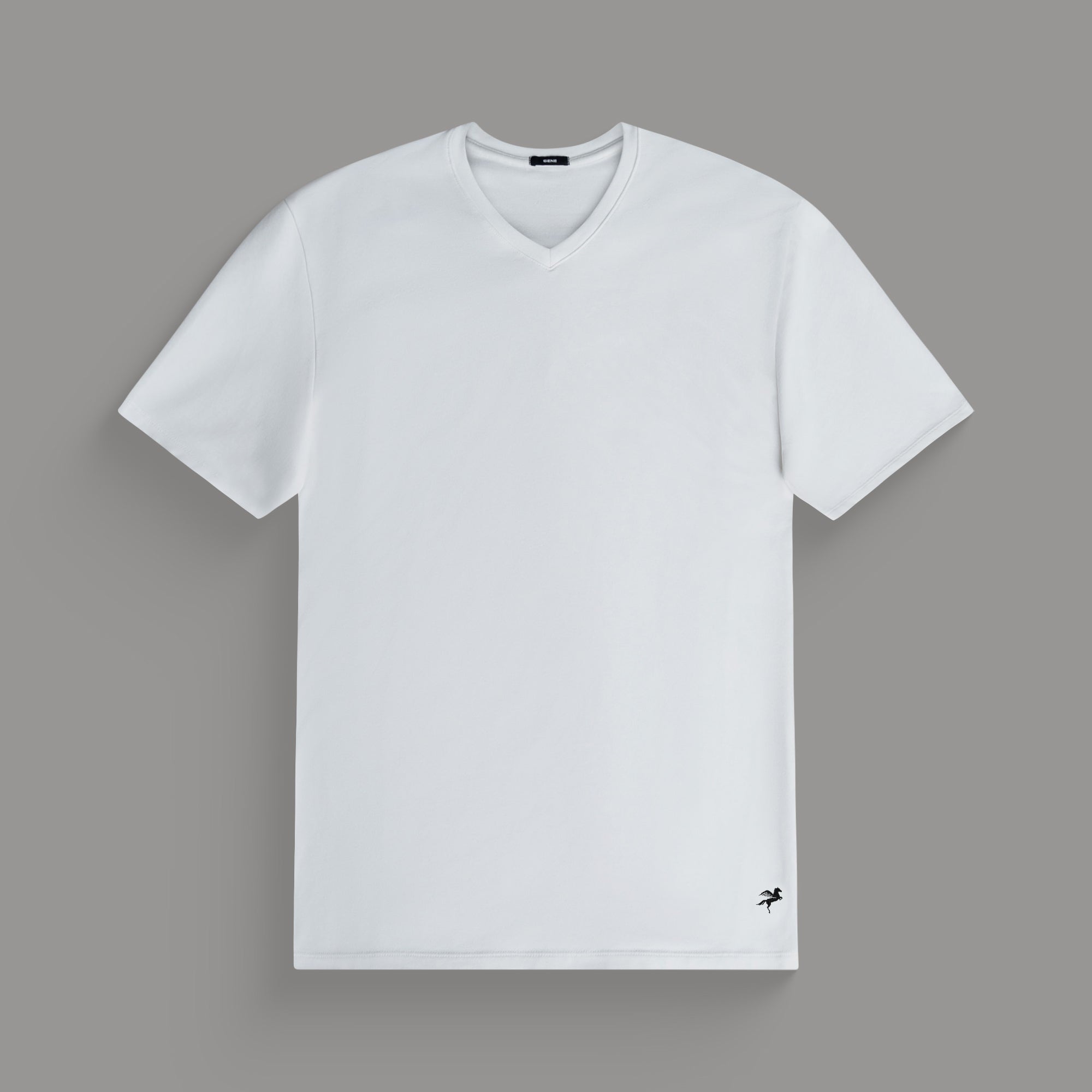 Cumulus v-neck t-shirt on a beige background model Tyler in Minimalist