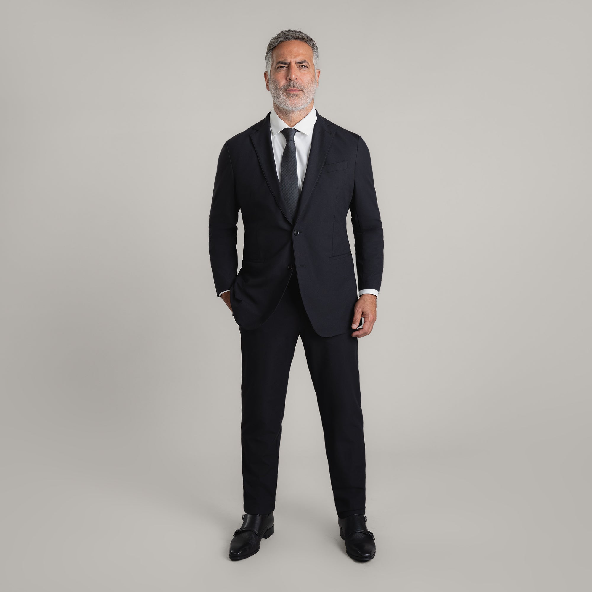 Tags:(5'11"|176 lbs) Bespoke custom athleisure technical men's suit los angeles model Guillermo in Black