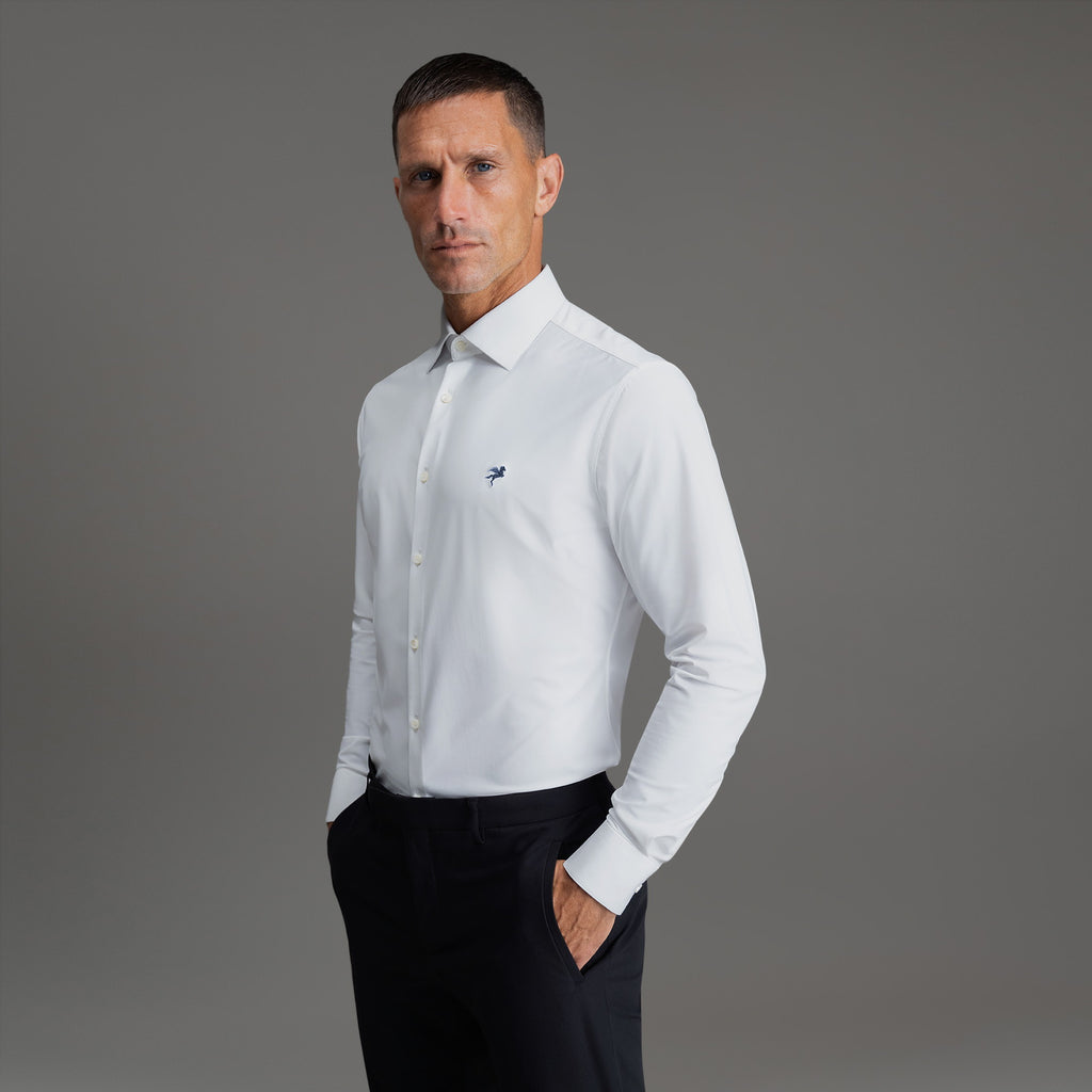Custom Bespoke Tailored Spread Shirt model Tyler in White Navy Emblem