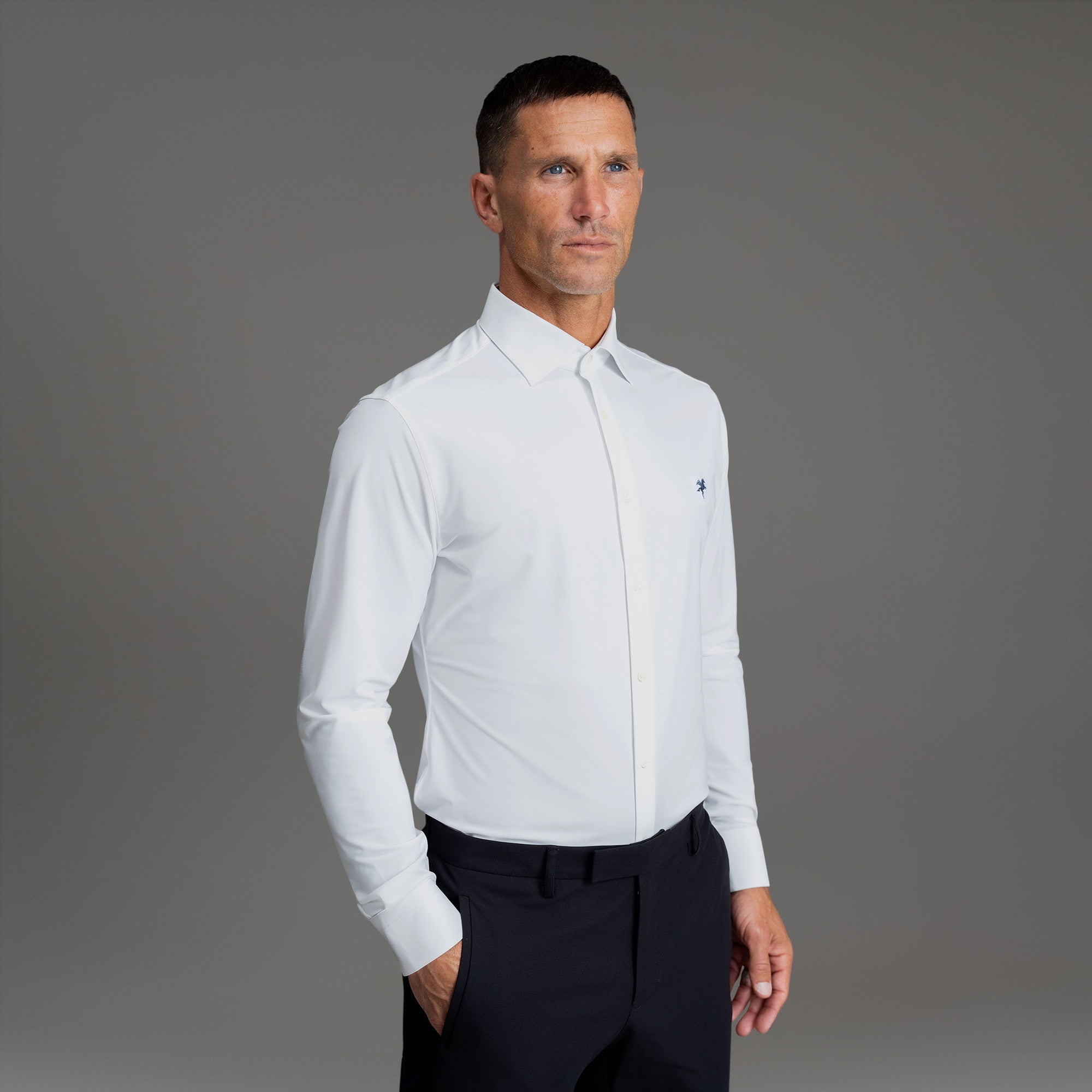 Custom Bespoke Tailored Spread Shirt model Tyler in White Navy Emblem