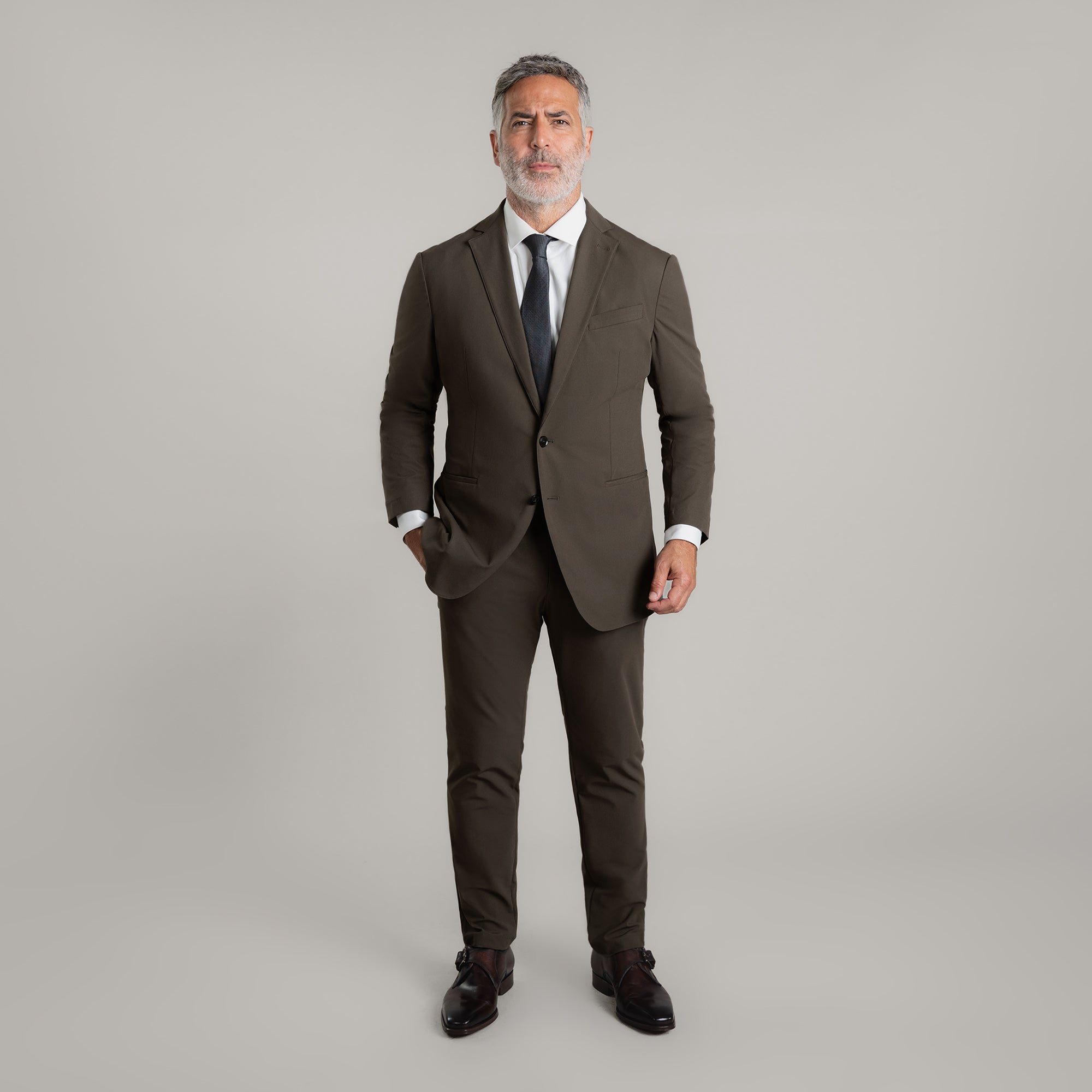 Tags:(5'11"|176 lbs)  Bespoke custom athleisure technical men's suit los angeles model Guillermo in Wood