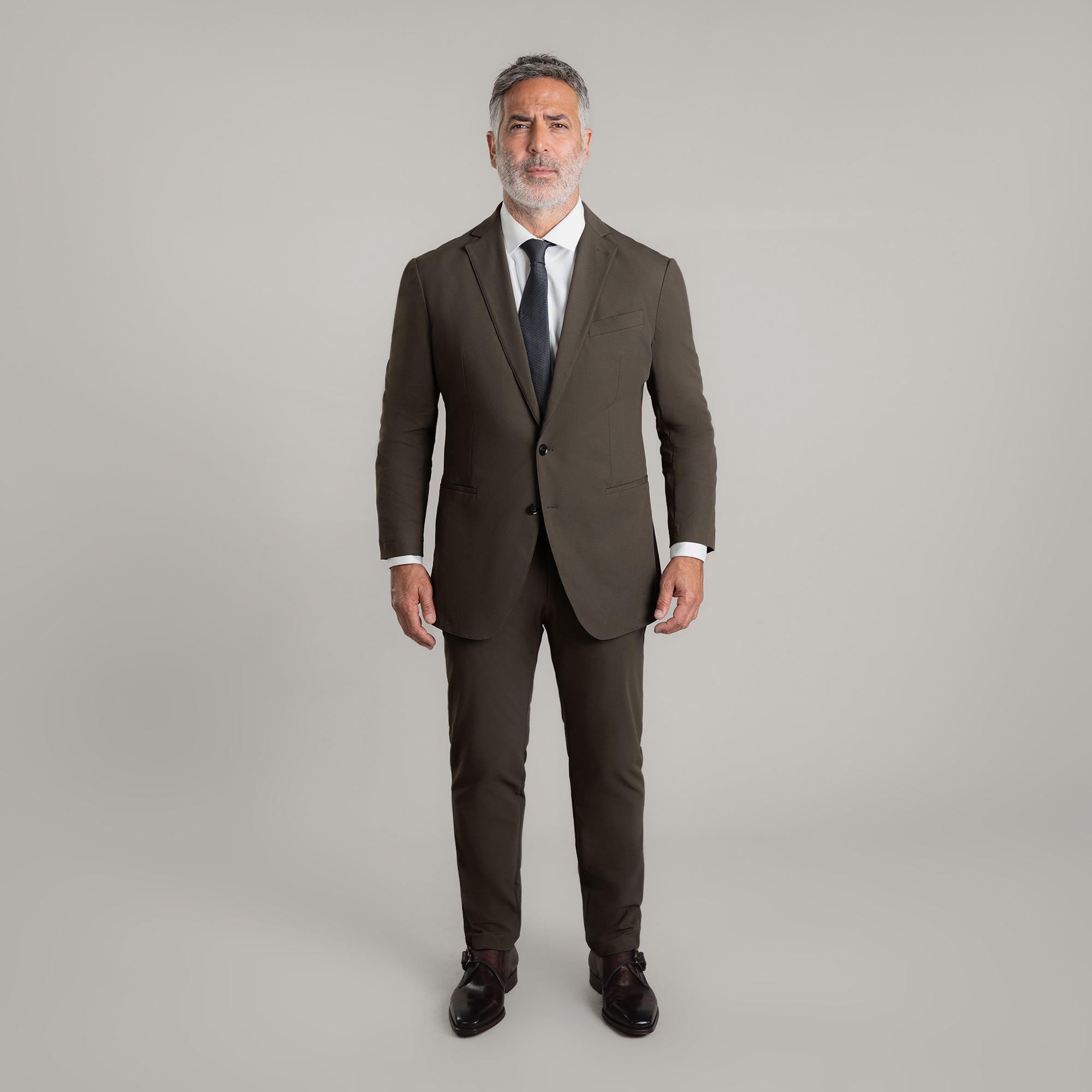 Bespoke custom athleisure technical athletic stretch suit los angeles model Guillermo in Wood