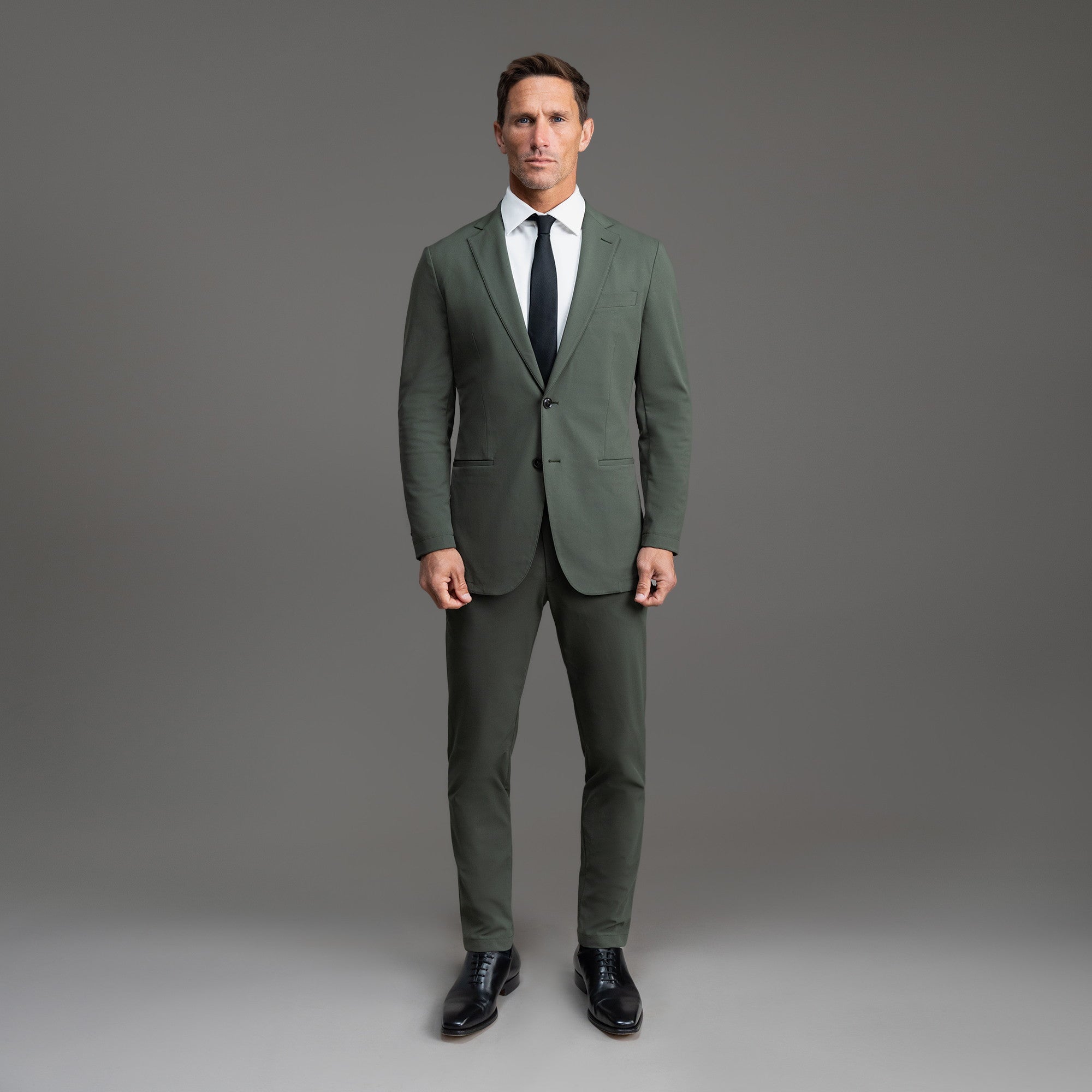 Bespoke custom athleisure technical men's suit los angeles model Tyler in Moss
