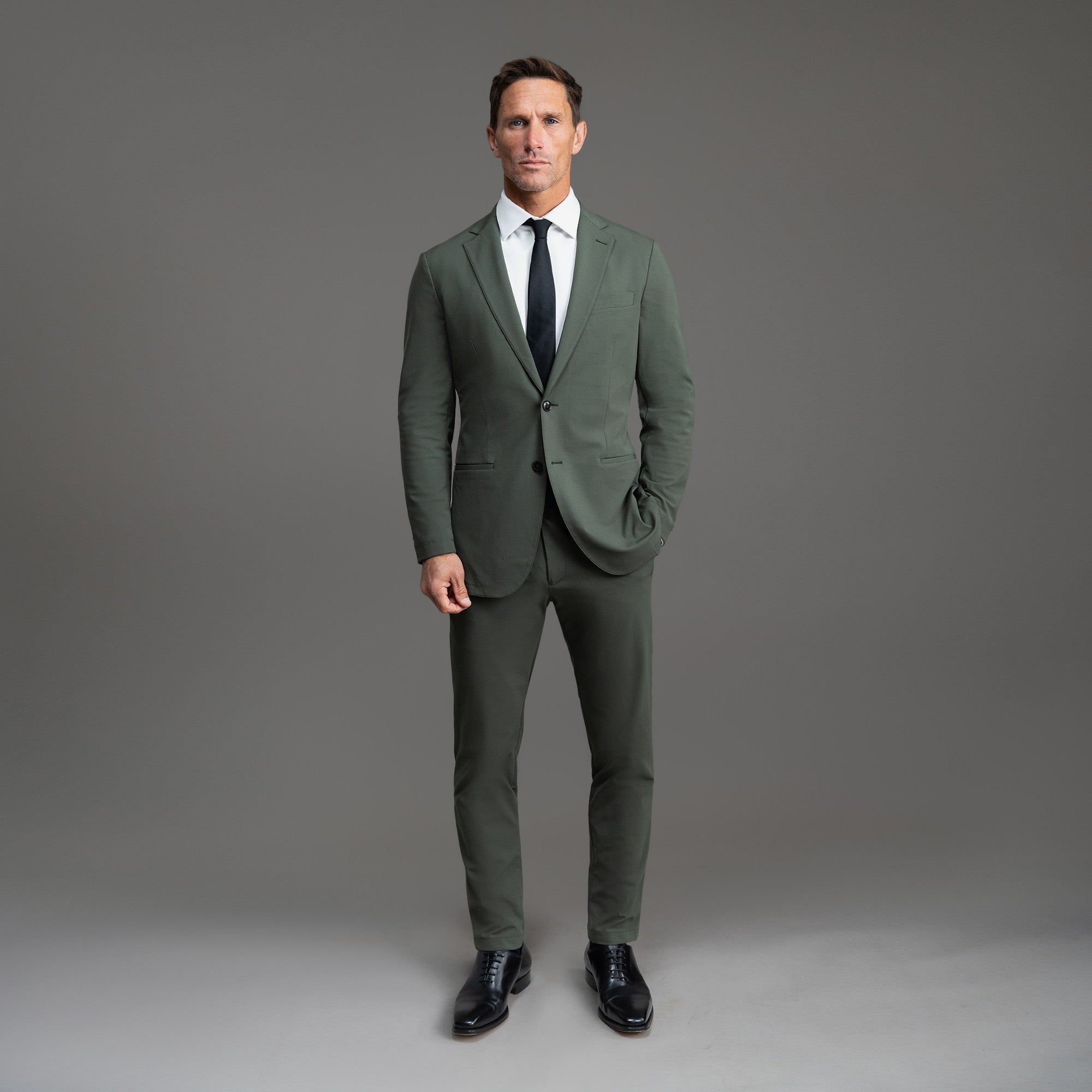 Bespoke custom athleisure technical men's suit los angeles model Tyler in Moss