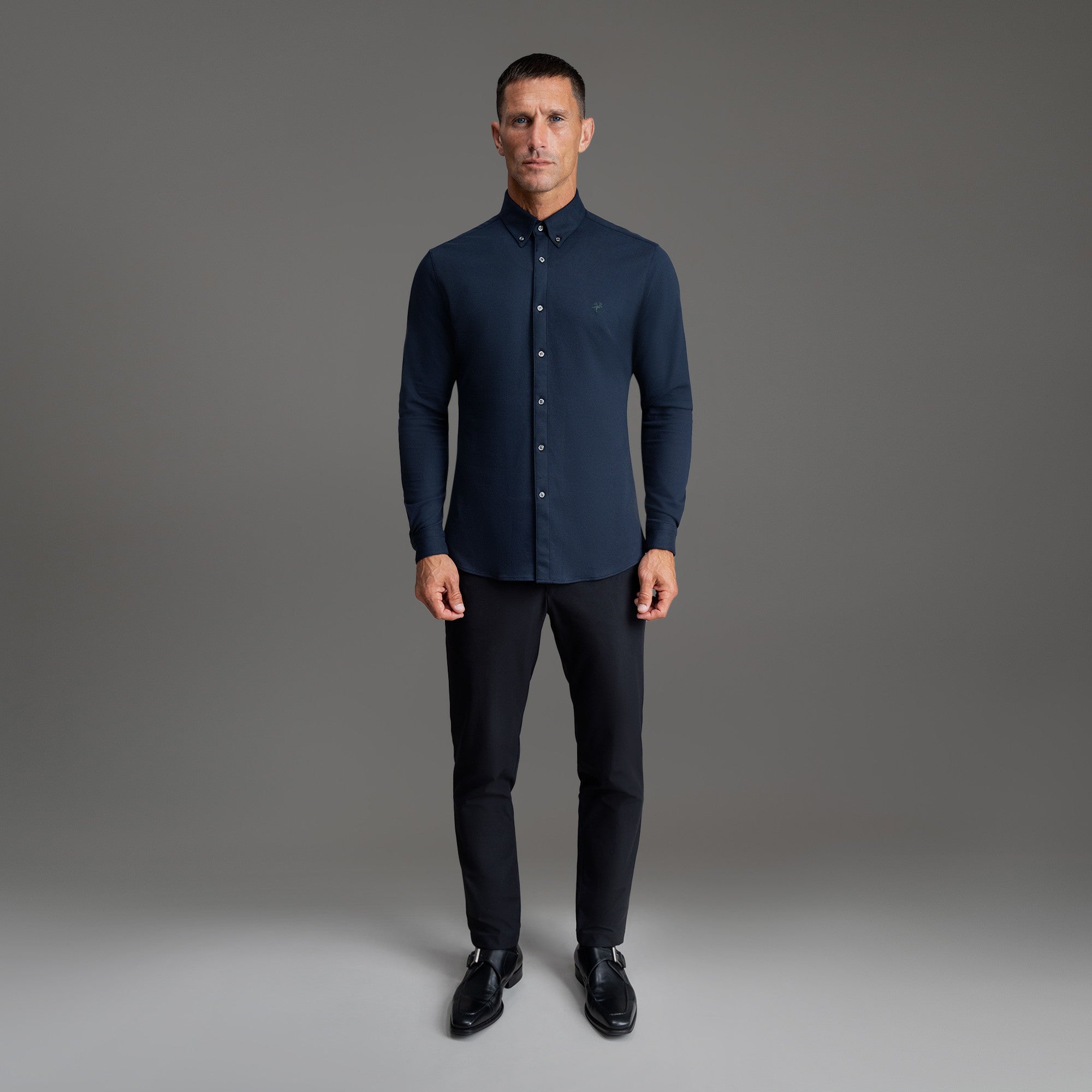 Custom Bespoke Tailored Mercer Shirt model Tyler in Navy Emblem