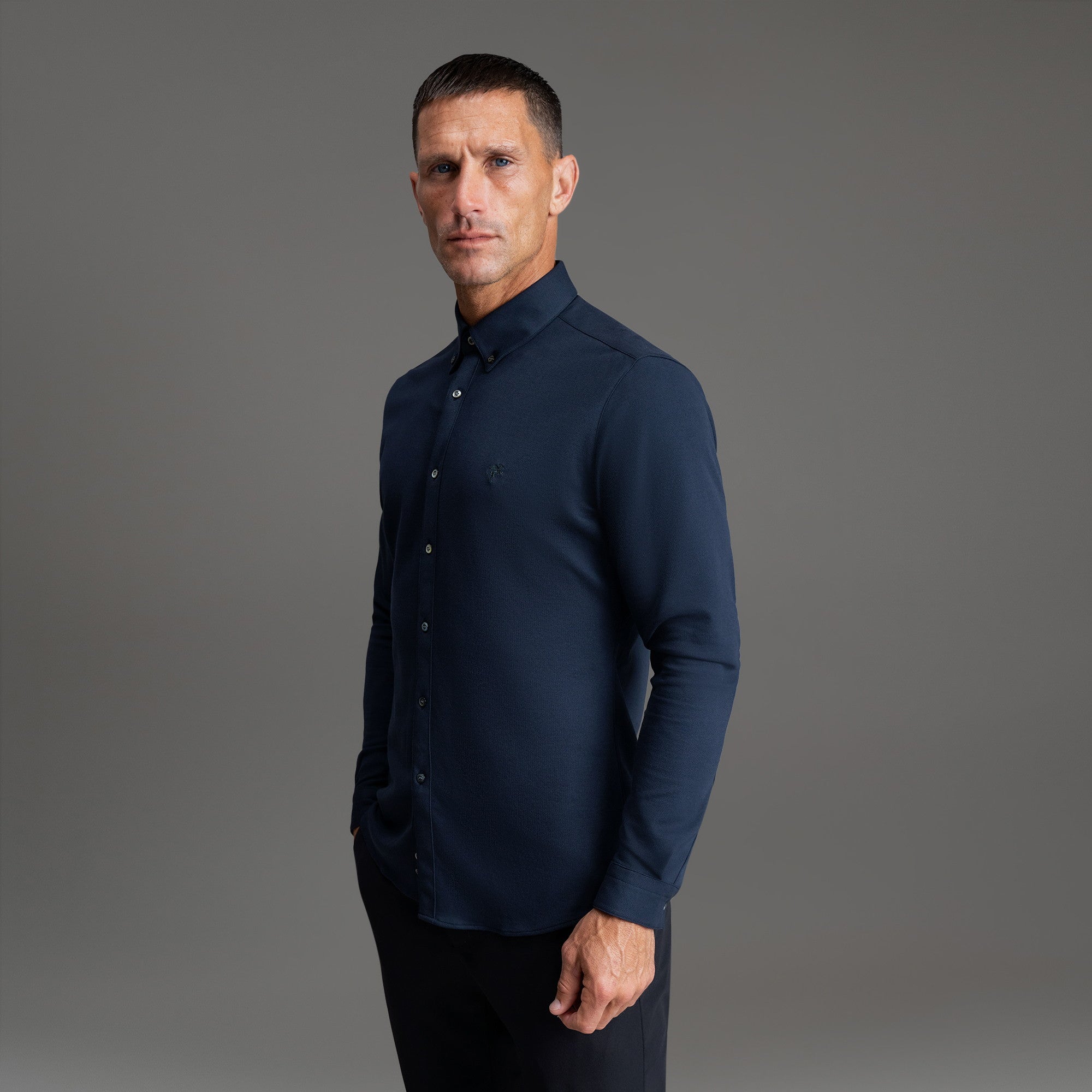 Custom Bespoke Tailored Spread Shirt model Tyler in Navy Emblem