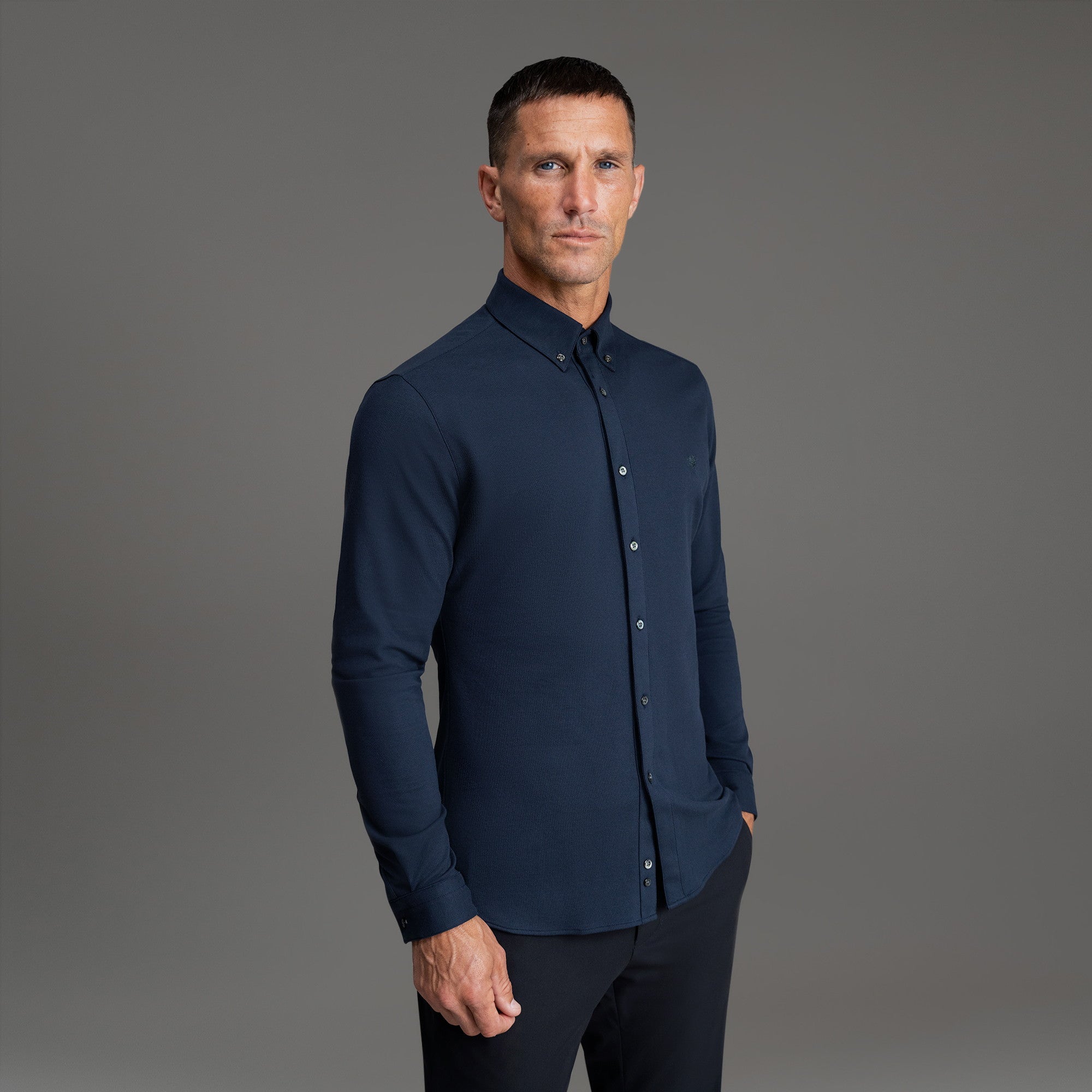 Custom Bespoke Tailored Spread Shirt model Tyler in Navy Emblem