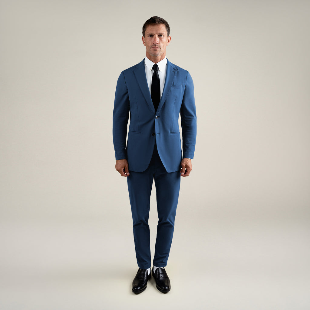 Tags:(6'0"|180 lbs) Bespoke custom athleisure technical athletic stretch suit los angeles model Tyler in Italian Blue