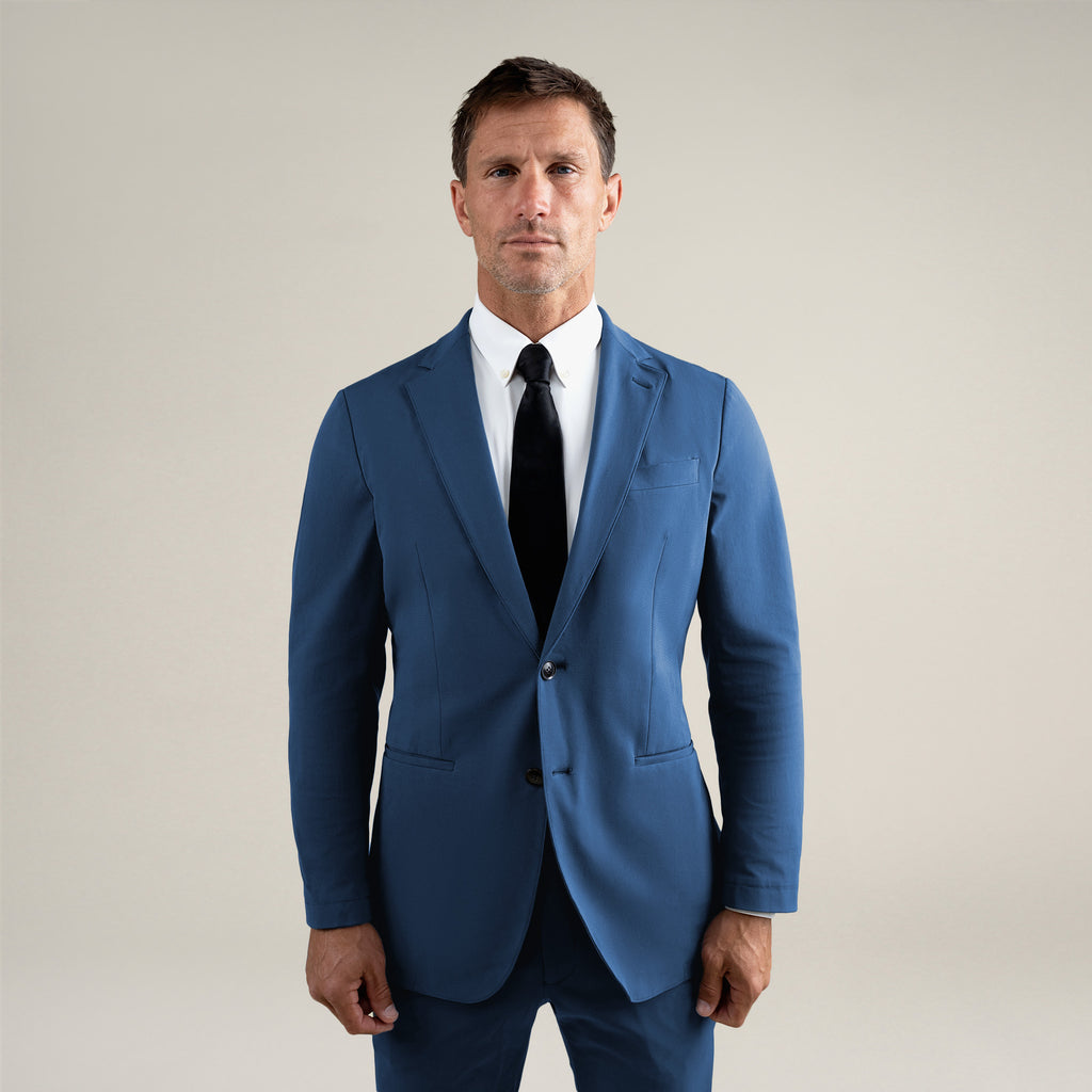 Tags:(6'0"|180 lbs) Bespoke custom athleisure technical athletic stretch suit los angeles model Tyler in Italian Blue