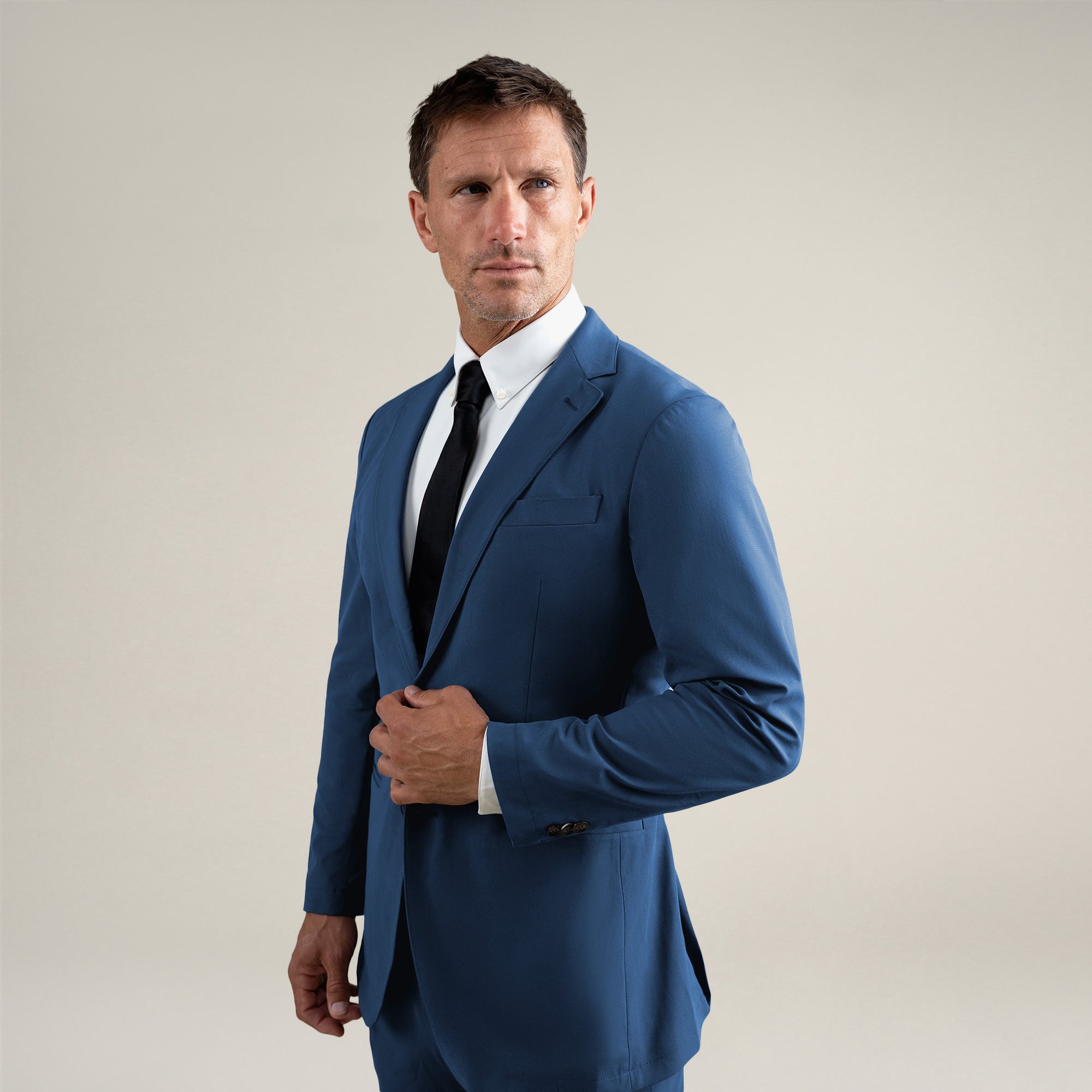 Tags:(6'0"|180 lbs) Bespoke custom athleisure technical athletic stretch suit los angeles model Tyler in Italian Blue