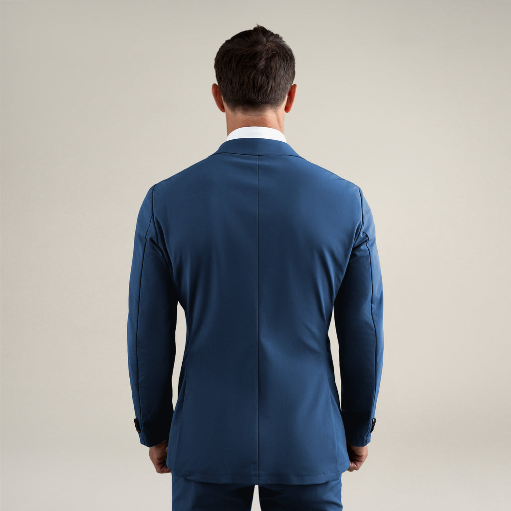 Tags:(6'0"|180 lbs) Bespoke custom athleisure technical athletic stretch suit los angeles model Tyler in Italian Blue