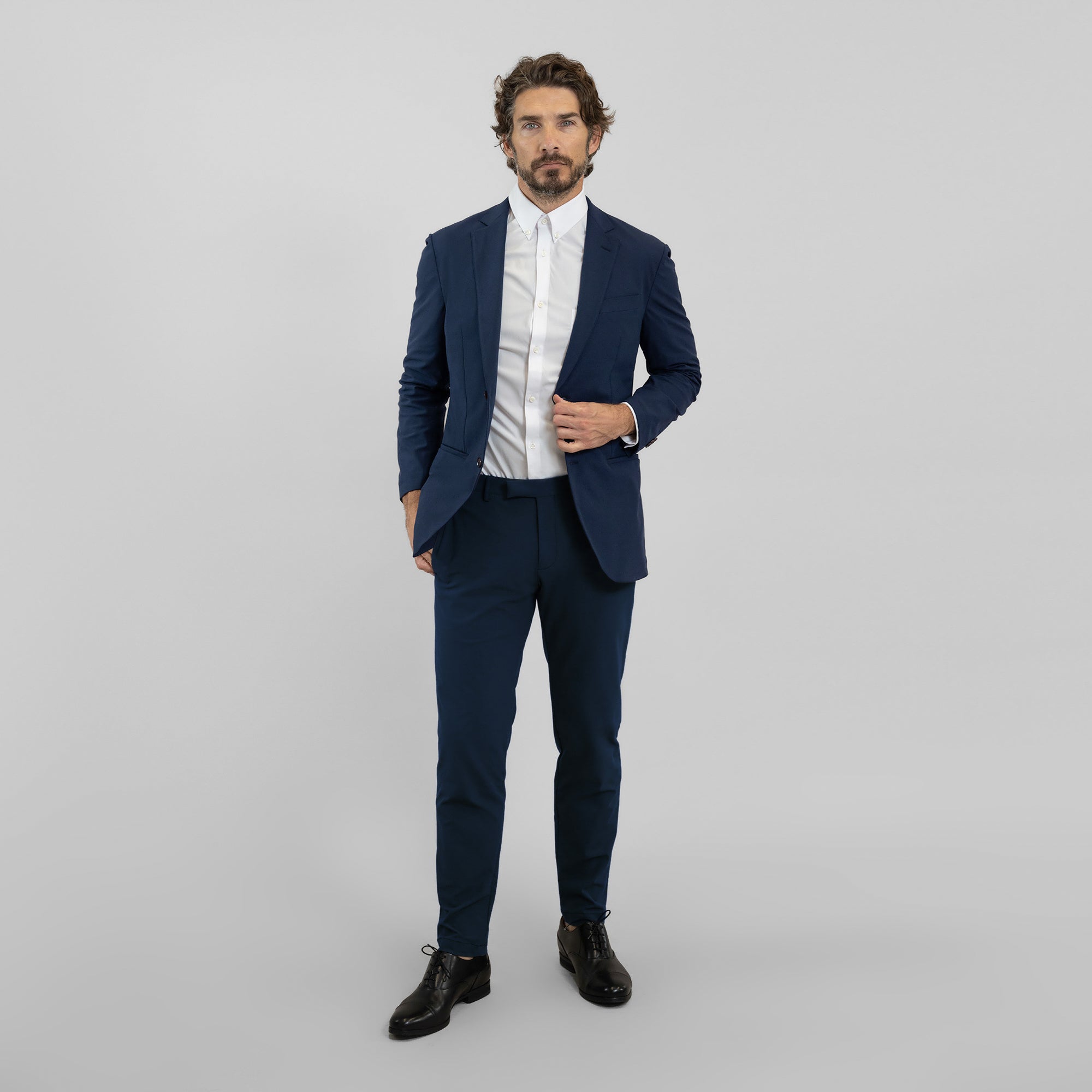 Tags:(6'0"|175 lbs) Bespoke custom athleisure technical men's suit los angeles model John in Navy