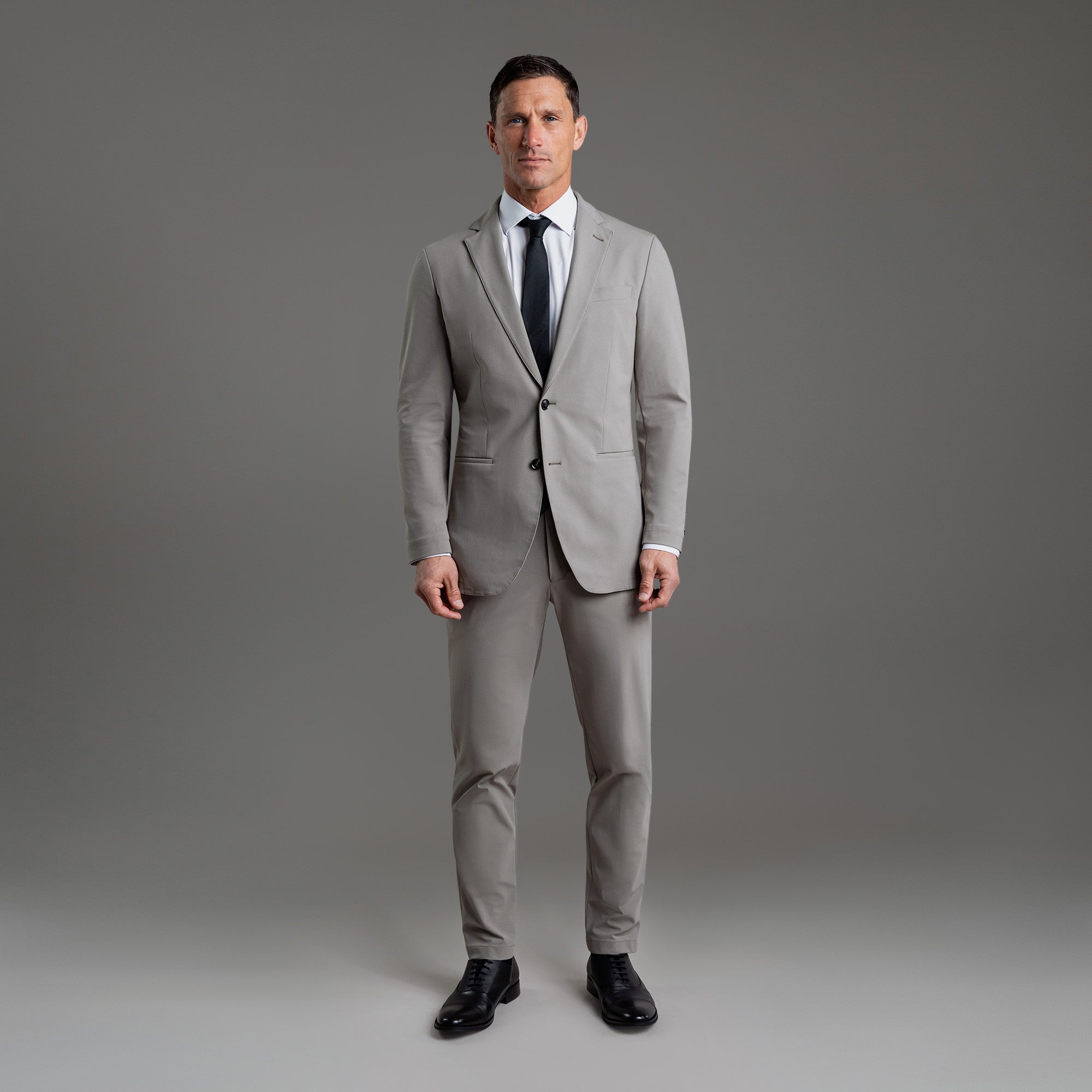 Tags:(6'0"|180 lbs) Bespoke custom athleisure technical men's suit los angeles model Tyler in Cement