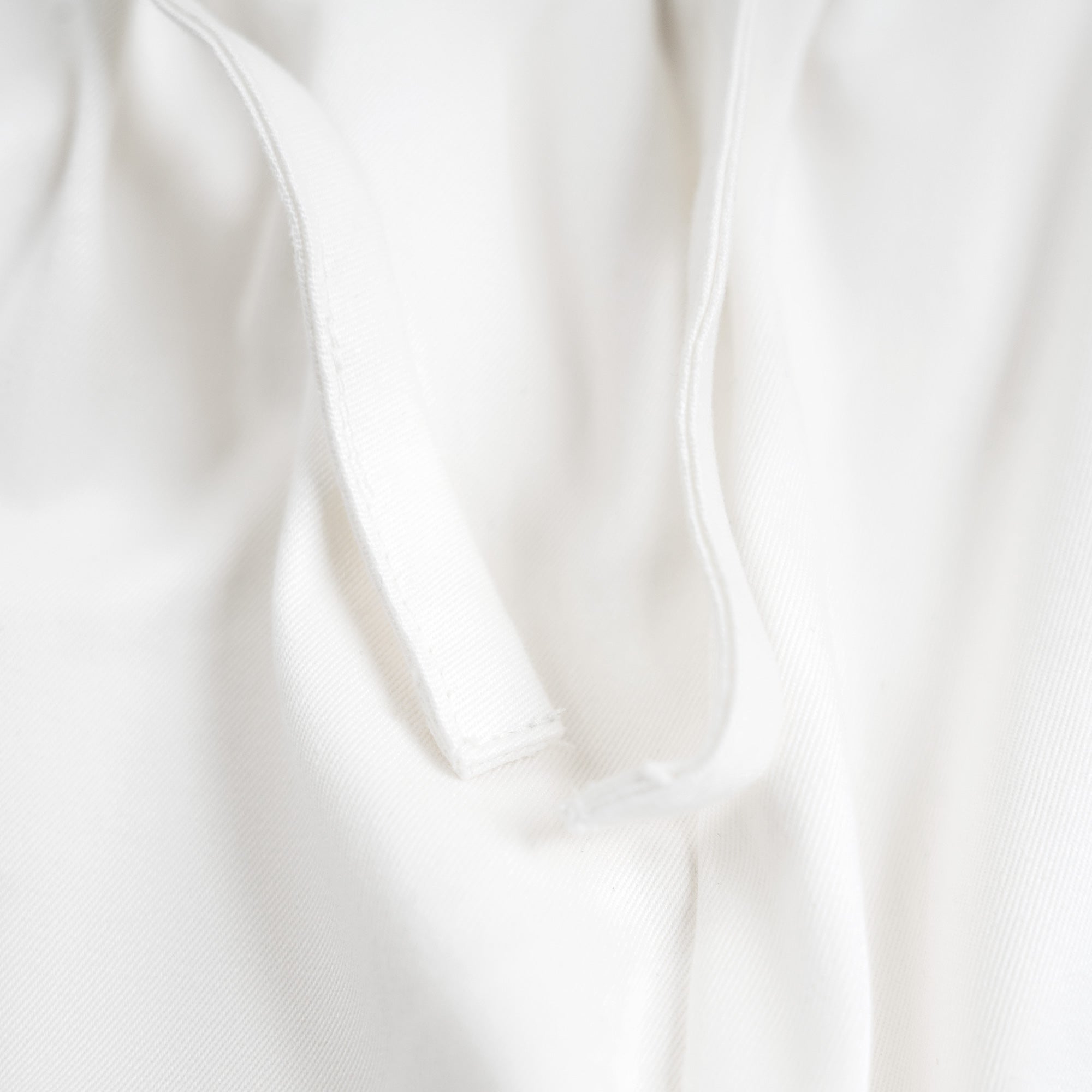 Stretch Cotton Drawstring Wide Leg Pant model Tyler in White